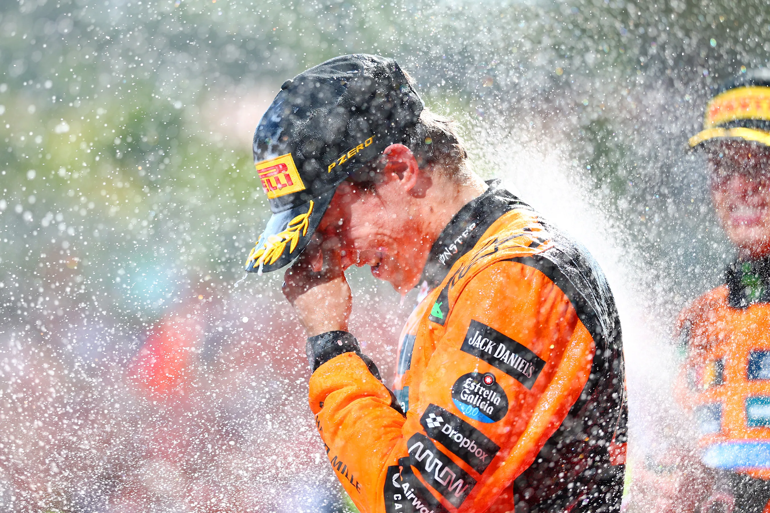 IMOLA, ITALY - MAY 18: Third placed Oscar Piastri of Australia and McLaren on the podium during the
