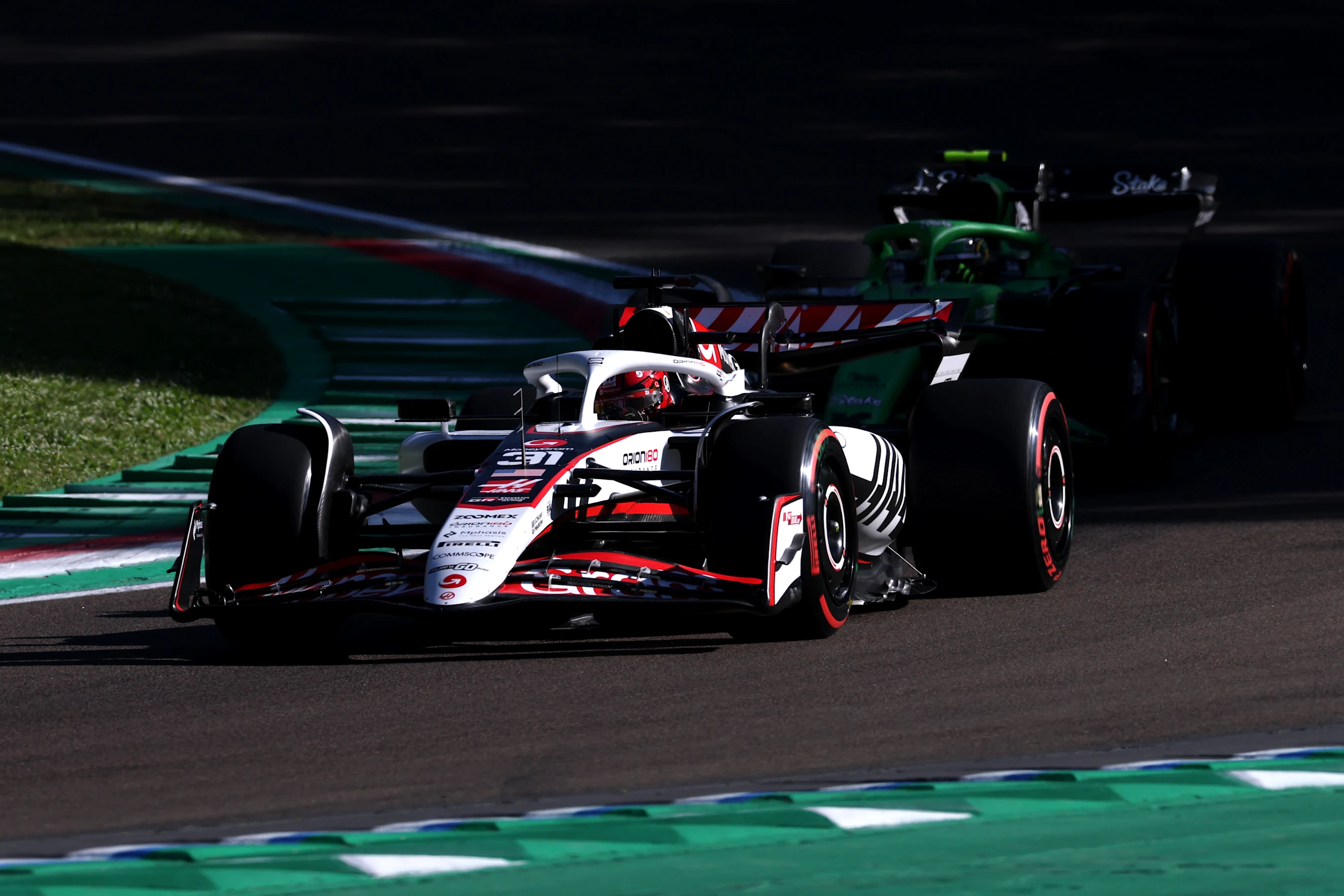 IMOLA, ITALY - MAY 16: Esteban Ocon of France driving the (31) Haas F1 VF-25 Ferrari leads Gabriel