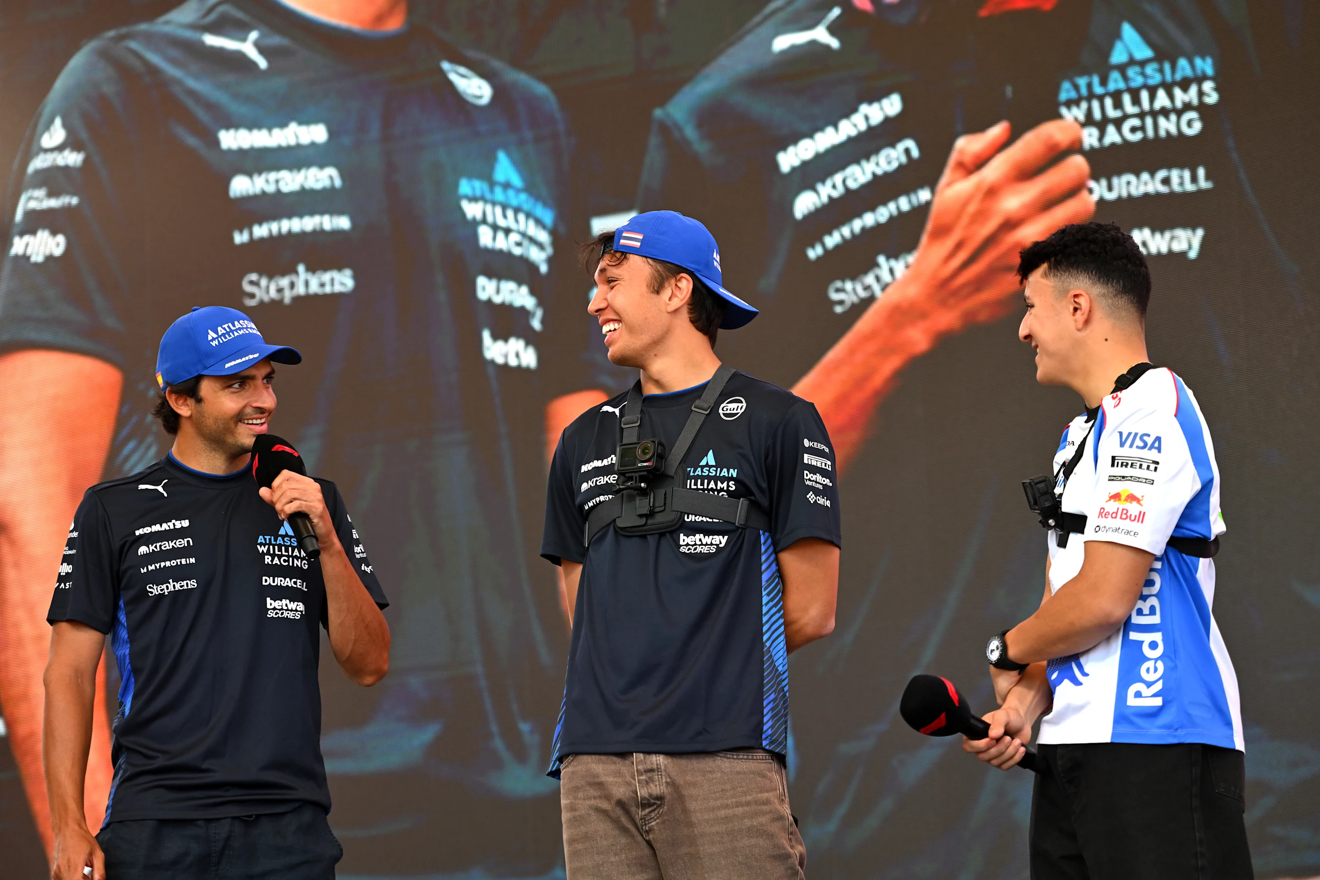 BUDAPEST, HUNGARY - AUGUST 01: Carlos Sainz of Spain and Williams, Alexander Albon of Thailand and