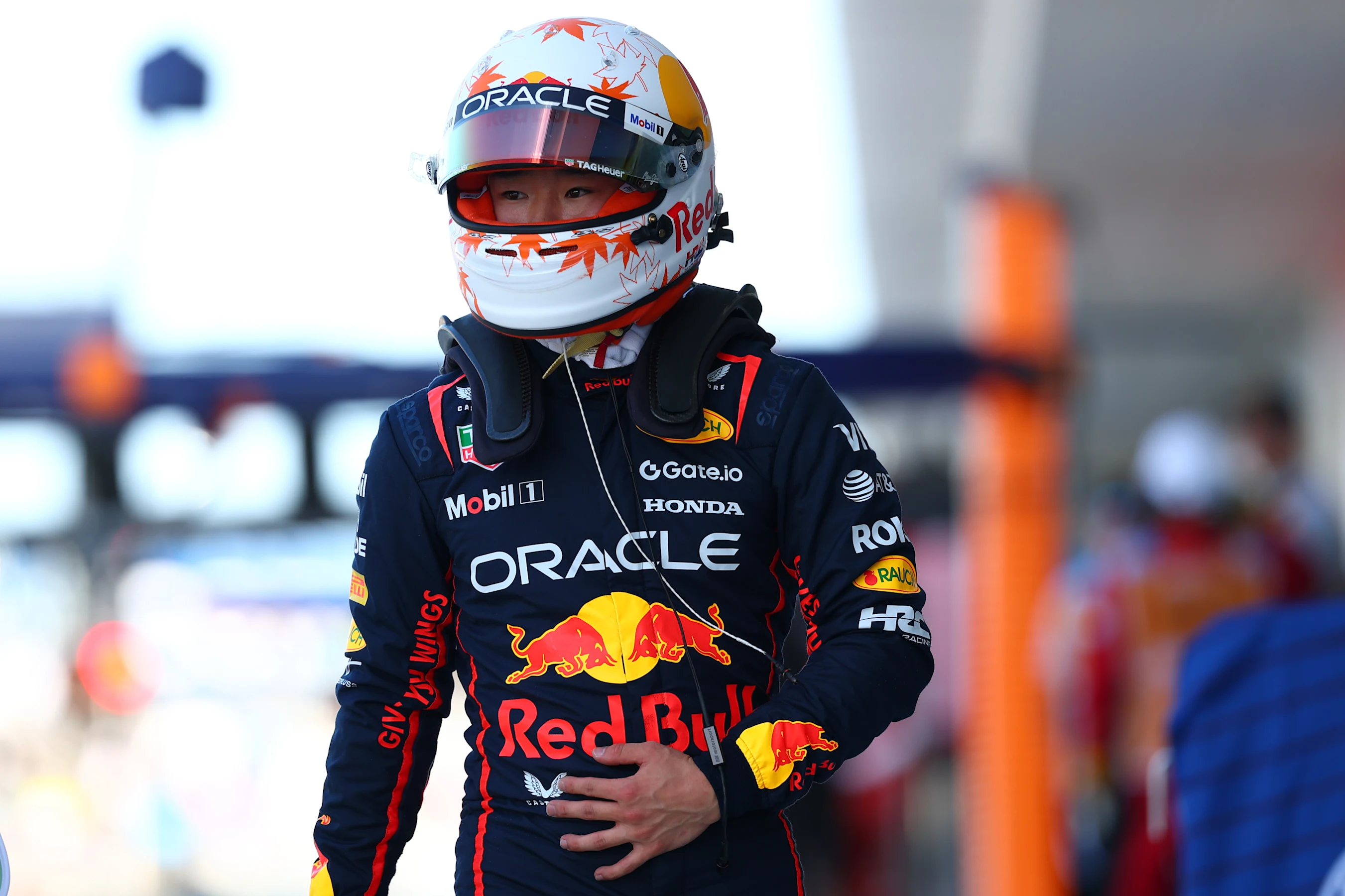 MIAMI, FLORIDA - MAY 02: Yuki Tsunoda of Japan and Oracle Red Bull Racing walks in the Pitlane