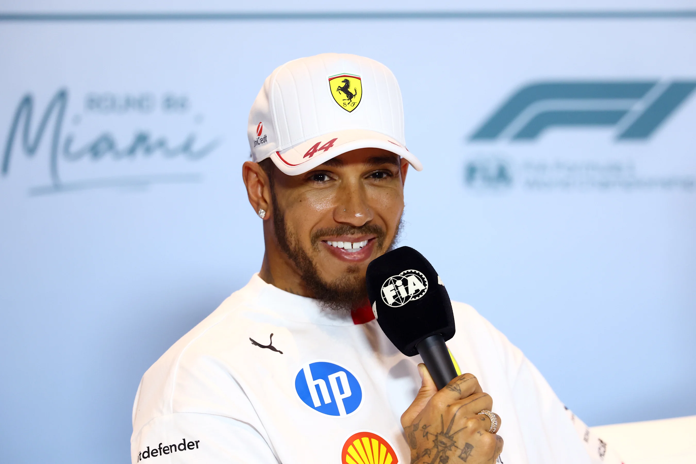 MIAMI, FLORIDA - MAY 01: Lewis Hamilton of Great Britain and Scuderia Ferrari speaks in the Drivers