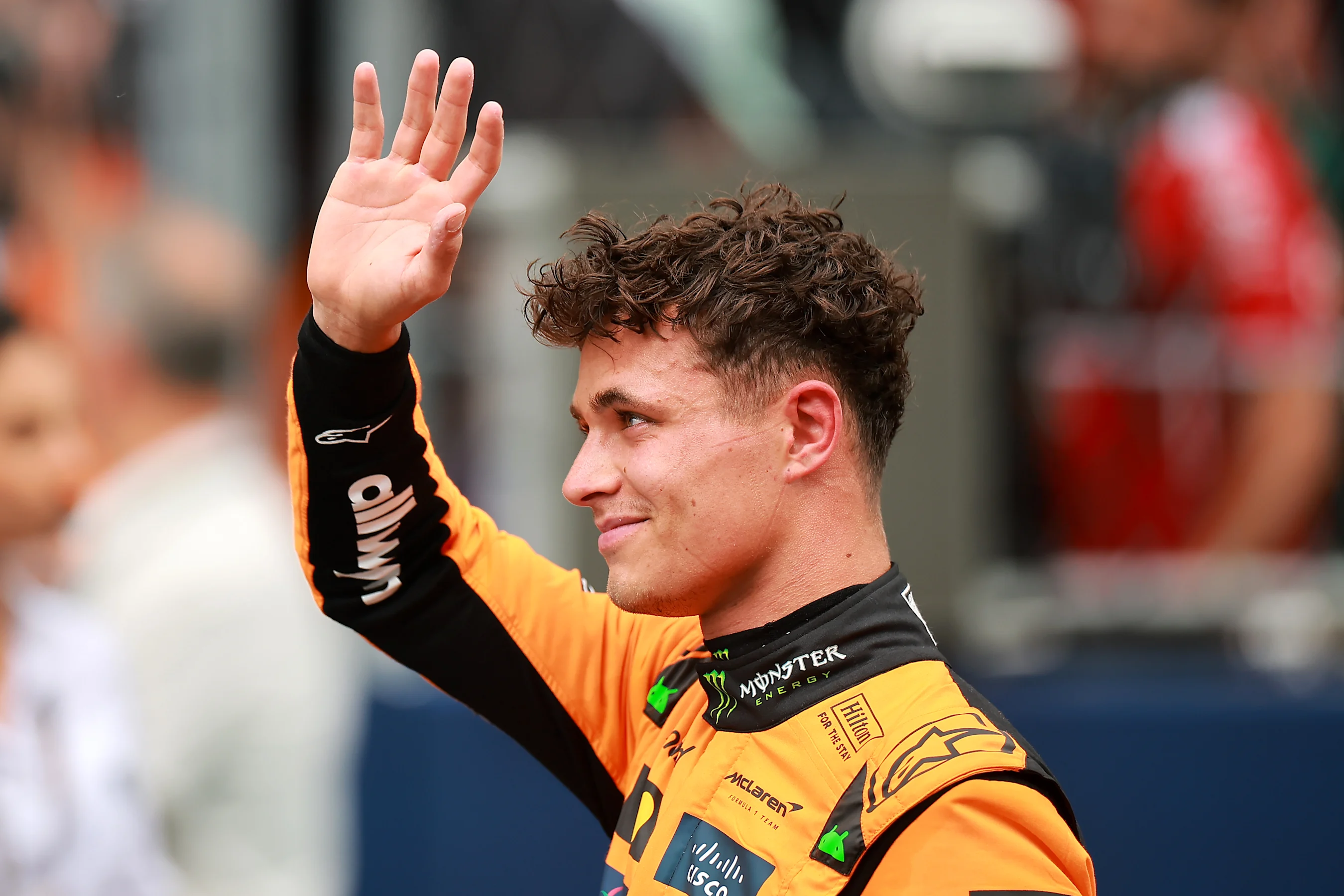 MIAMI, FLORIDA - MAY 03: Sprint winner Lando Norris of Great Britain and McLaren waves in parc