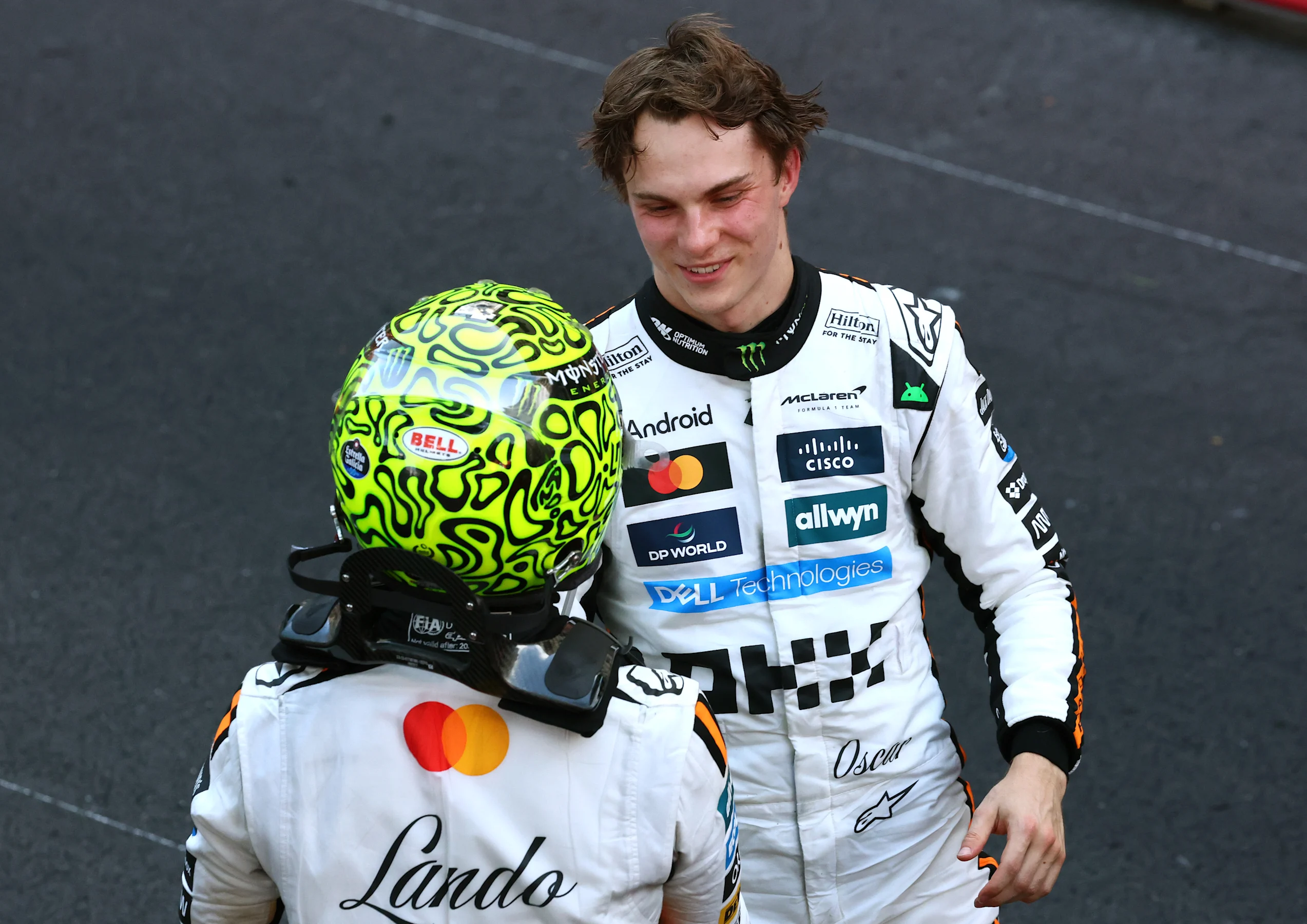 MONTE-CARLO, MONACO - MAY 25: Third placed Oscar Piastri of Australia and McLaren congratulates