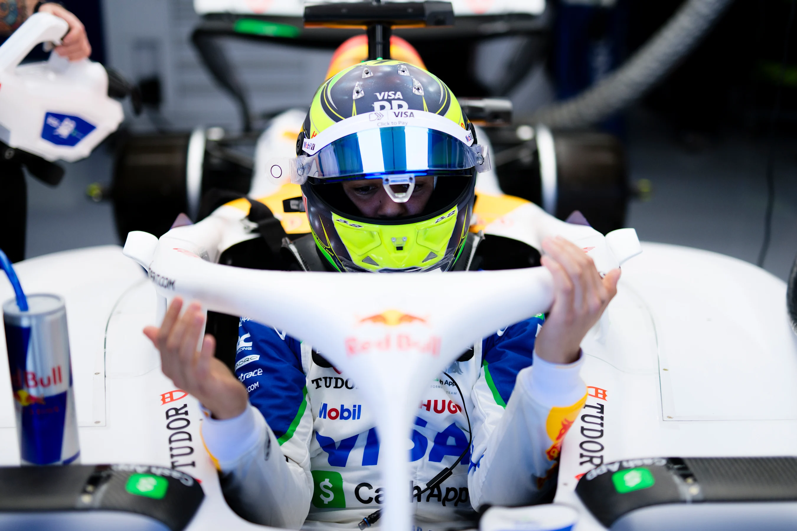 BARCELONA, SPAIN - MAY 30: Isack Hadjar of France and Visa Cash App Racing Bulls prepares to drive
