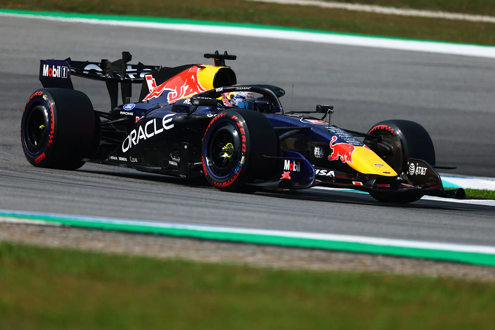 Max Verstappen driving the Red Bull RB22 during qualifying at Sepang