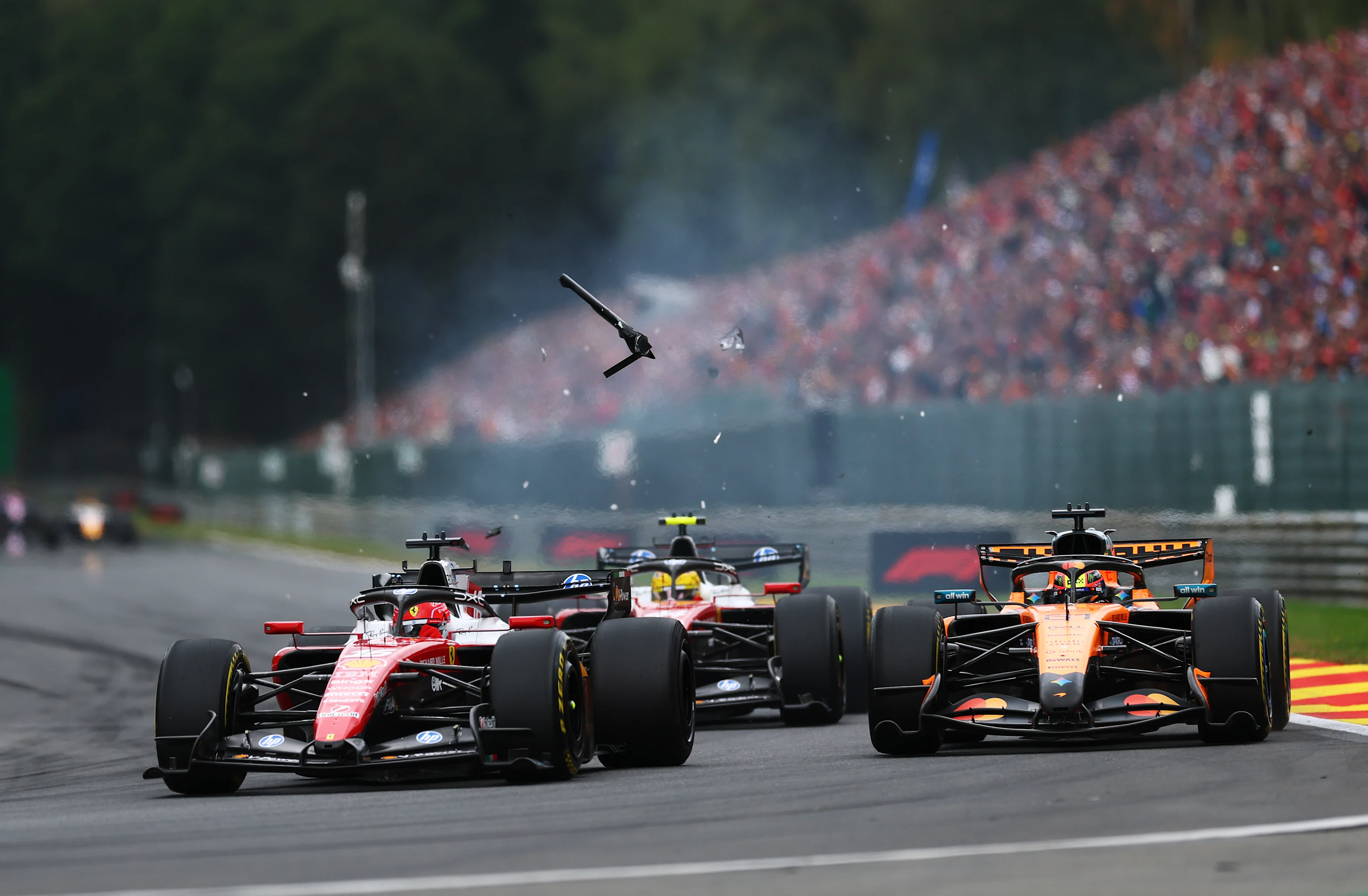 Ferrari and McLaren cars battle during the 2026 Belgian Grand Prix at Spa-Francorchamps