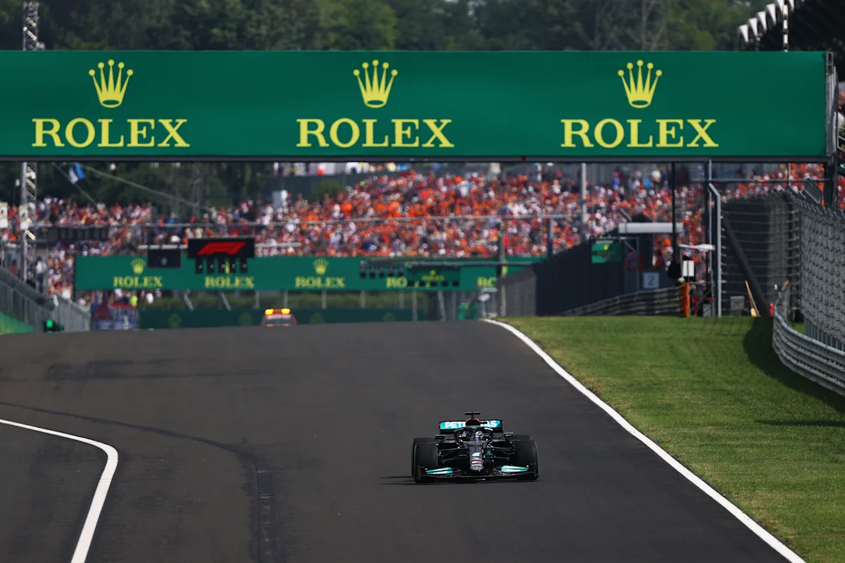 Lewis Hamilton takes the 2021 Hungarian Grand Prix restart alone after the rest of the field pits.
