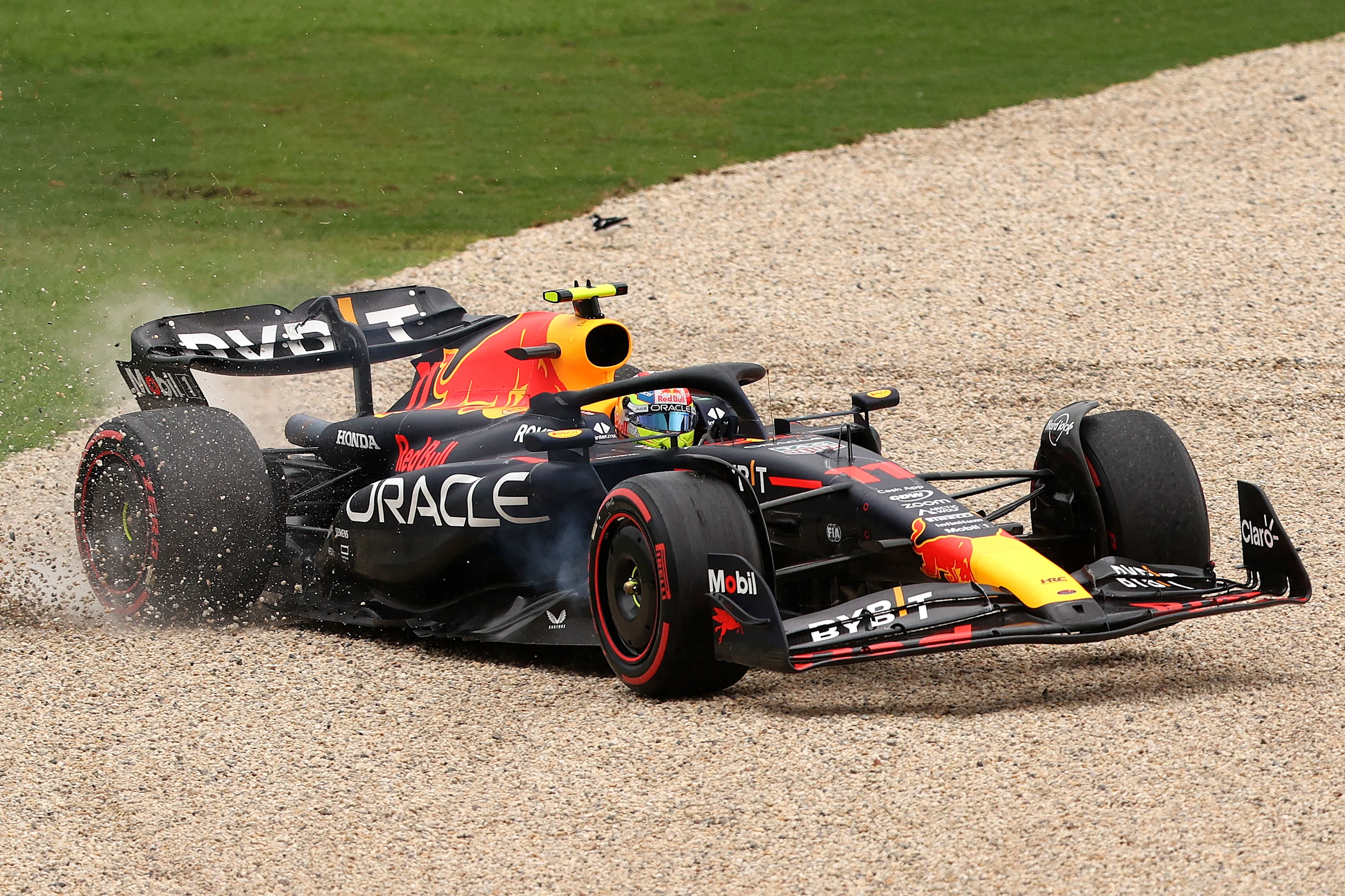 Red Bull Racing's Mexican driver Sergio Perez recovers after going off the track during the third