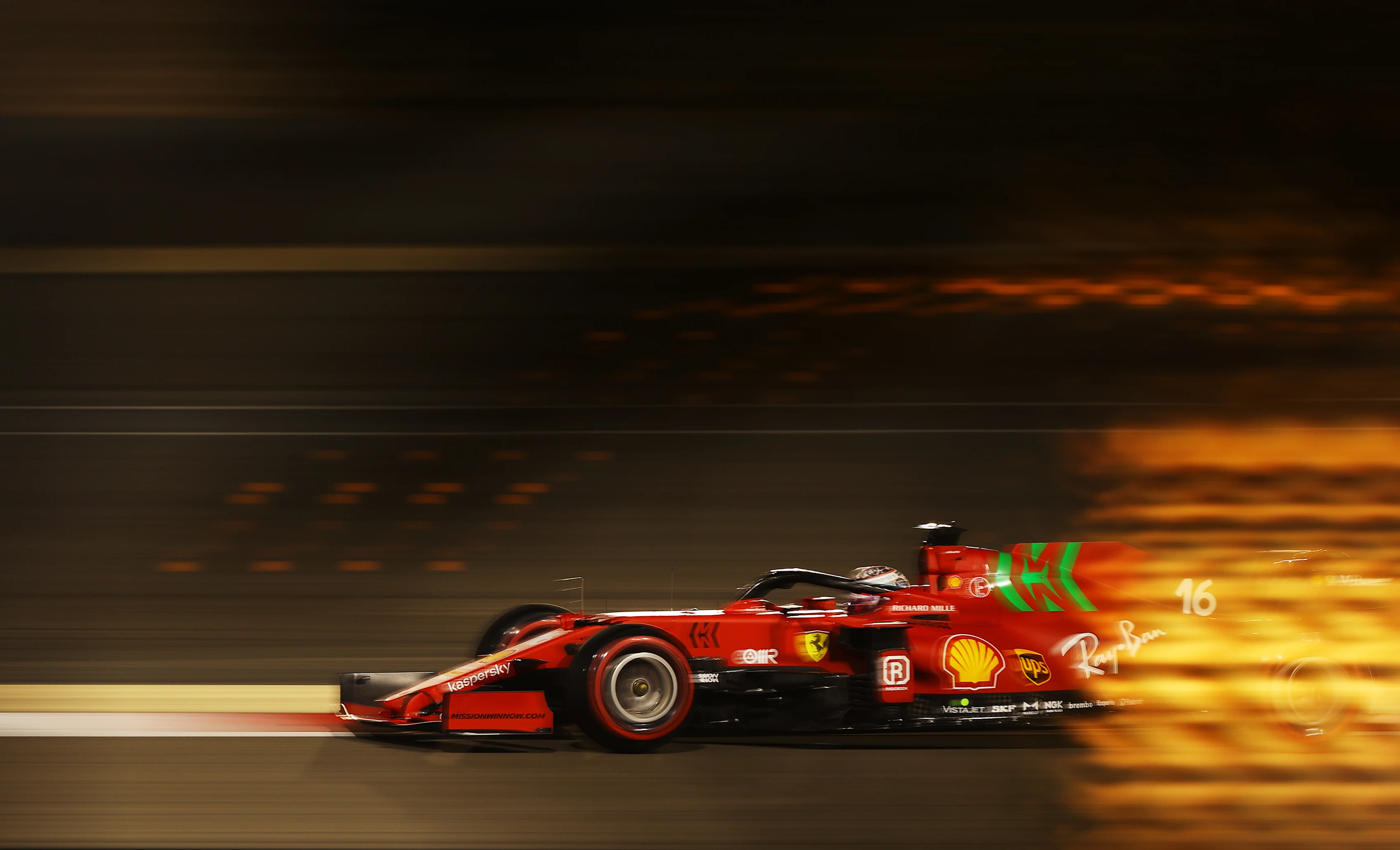 BAHRAIN, BAHRAIN - MARCH 27: Charles Leclerc of Monaco driving the (16) Scuderia Ferrari SF21 on track during qualifying ahead of the F1 Grand Prix of Bahrain at Bahrain International Circuit on March 27, 2021 in Bahrain, Bahrain. (Photo by Bryn Lennon/Getty Images)