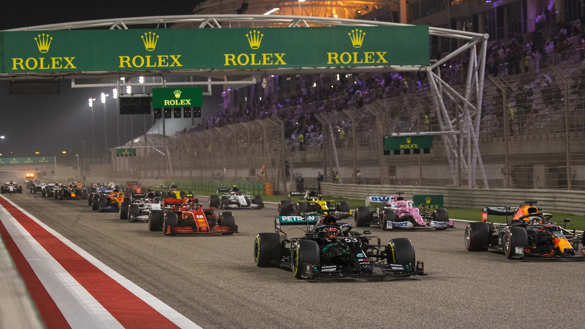 (L to R): George Russell (GBR) Mercedes AMG F1 W11 and Max Verstappen (NLD) Red Bull Racing RB16 at