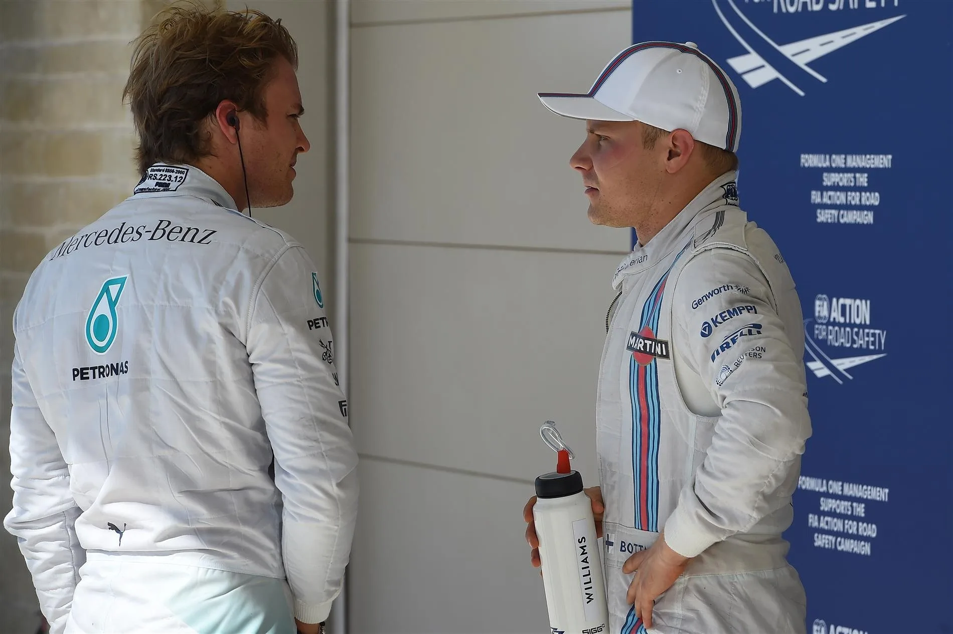 Pole position sitter Nico Rosberg (GER) Mercedes AMG F1 chats to third placed Valtteri Bottas (FIN) Williams Martini Racing in parc ferme. Formula One World Championship, Rd17, United States Grand Prix, Qualifying, Austin, Texas, USA, Saturday, 1 November 2014 