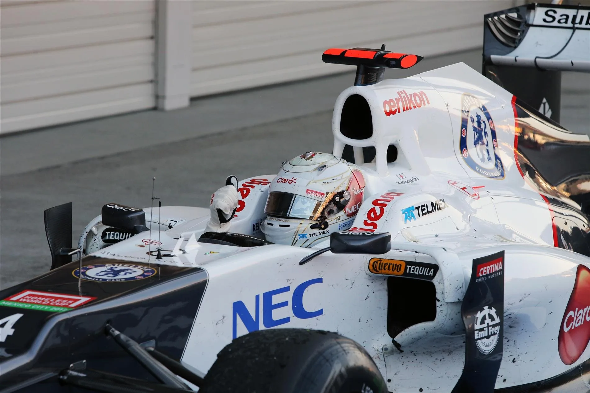 Kamui Kobayashi (JPN) Sauber C31 celebrates in parc ferme. Formula One World Championship, Rd15, Japanese Grand Prix, Race, Suzuka, Japan, Sunday, 7 October 2012. © Sutton Images