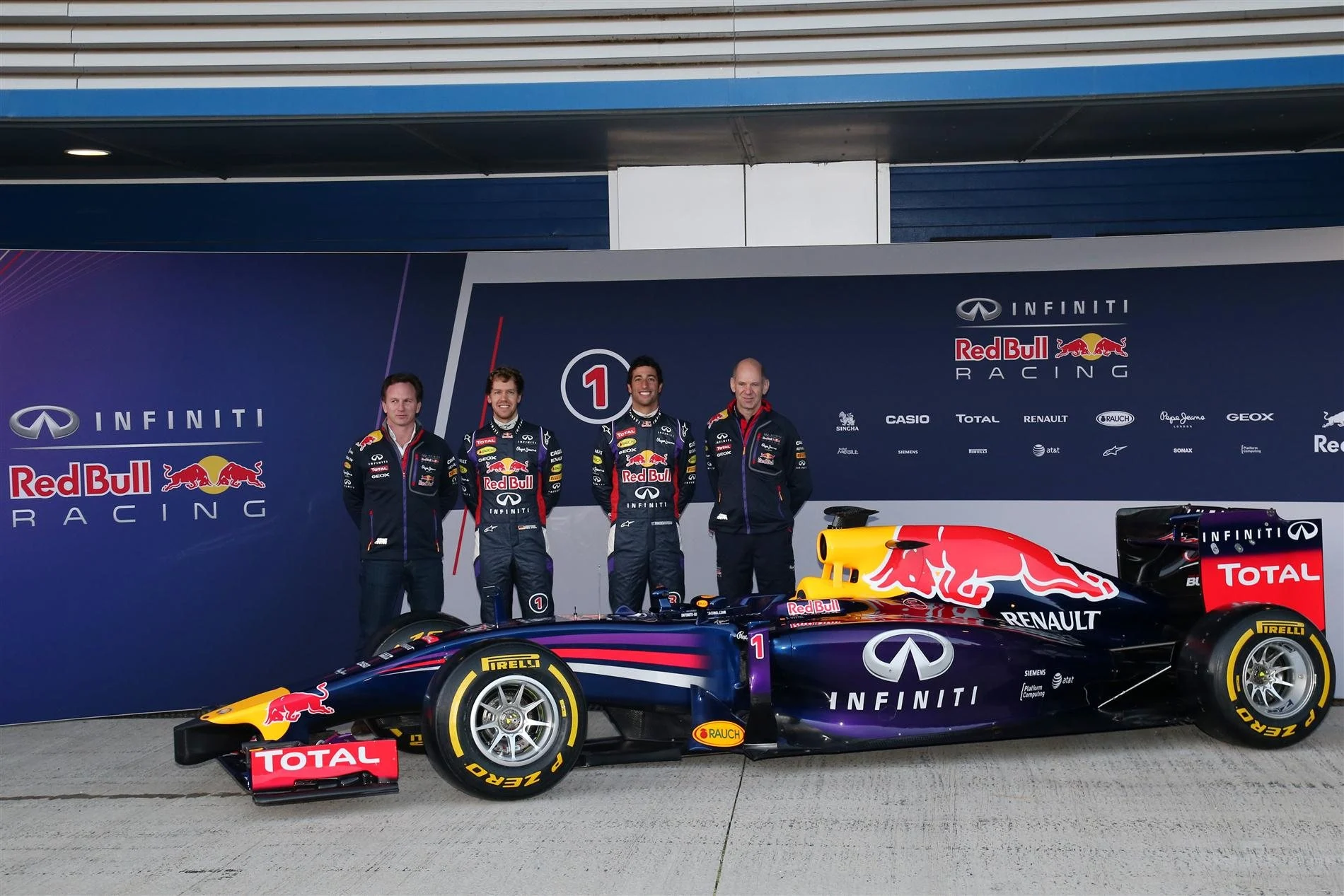 (L to R): Christian Horner (GBR) Red Bull Racing Team Principal, Sebastian Vettel (GER) Red Bull Racing and Daniel Ricciardo (AUS) Red Bull Racing and Adrian Newey (GBR) Red Bull Racing Chief Technical Officer with the new Red Bull Racing RB10. Formula One Testing, Jerez, Spain, Day One, Tuesday, 28 January 2014