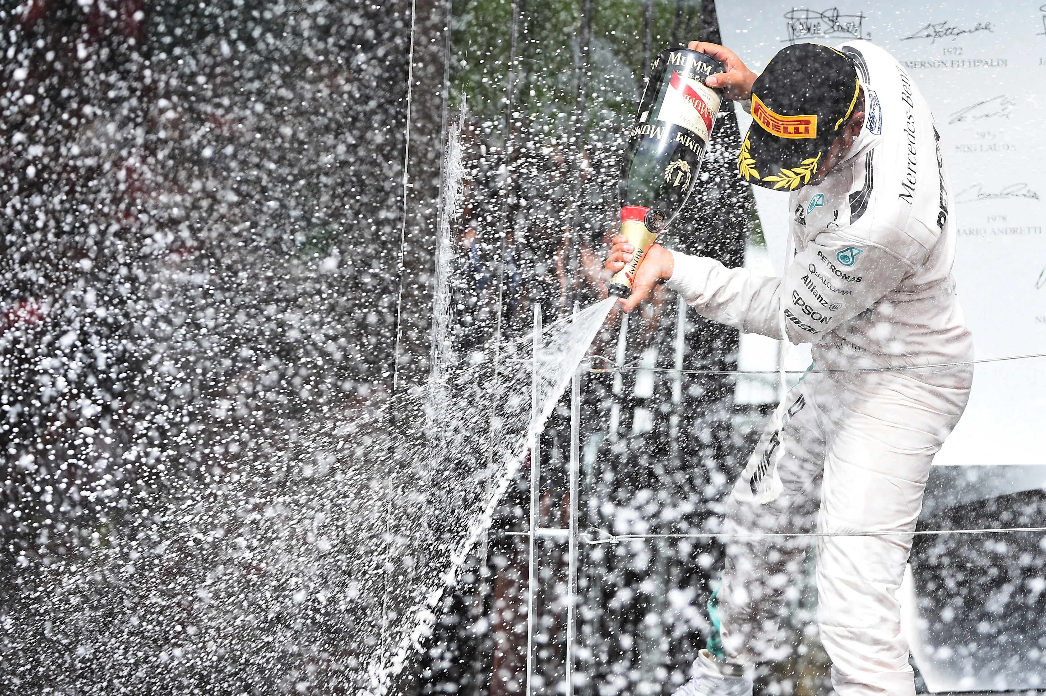 www.sutton-images.com Race winner Lewis Hamilton (GBR) Mercedes AMG F1 celebrates on the podium