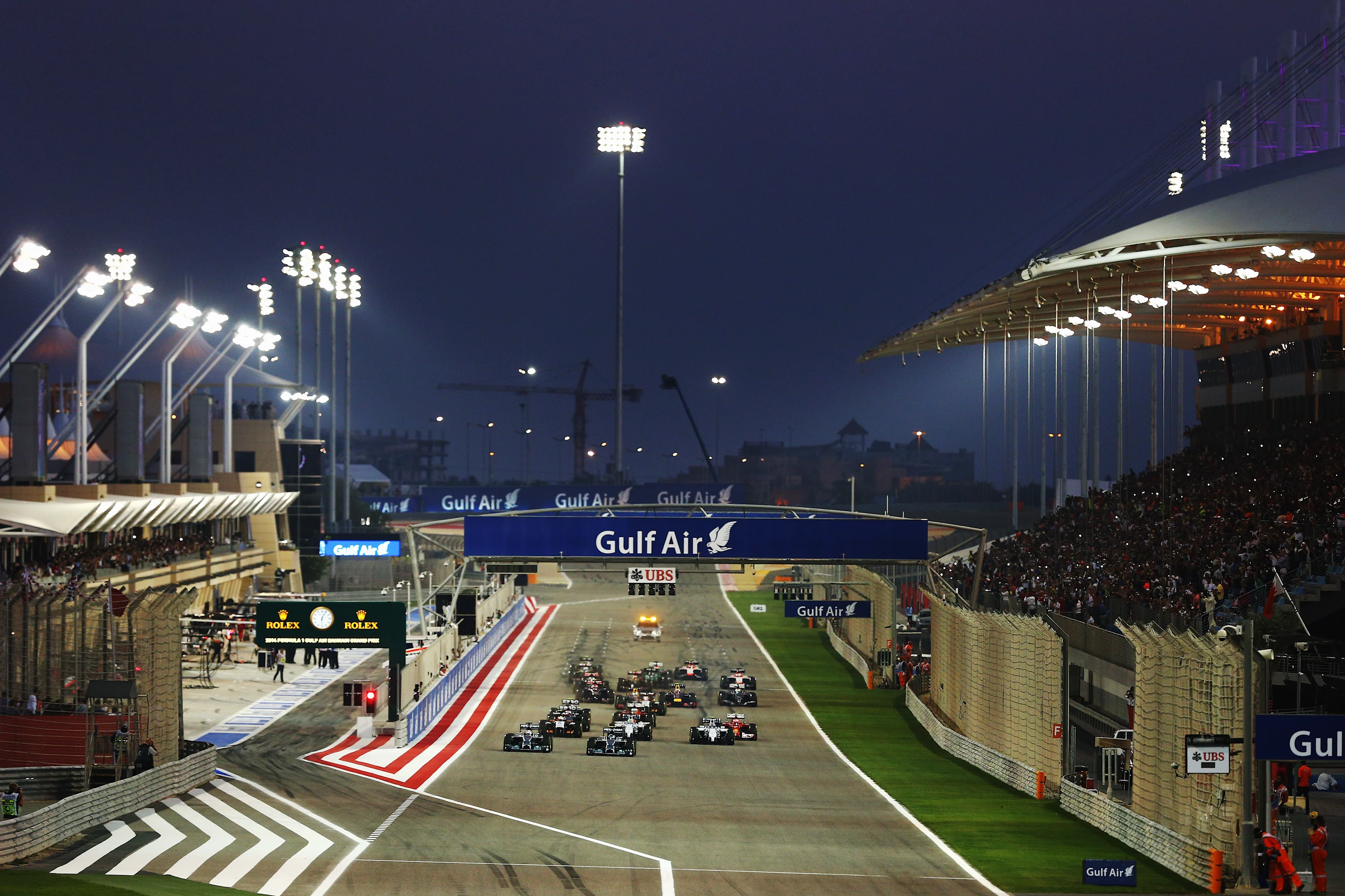 SAKHIR, BAHRAIN - APRIL 06: Lewis Hamilton (L) of Great Britain and Mercedes GP and team mate Nico