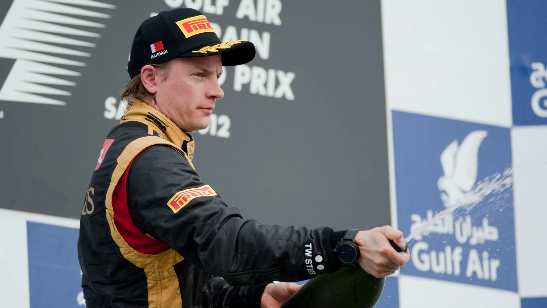 SAKHIR, BAHRAIN - APRIL 22: Kimi Raikkonen of Finland and Lotus celebrates 2nd place during the