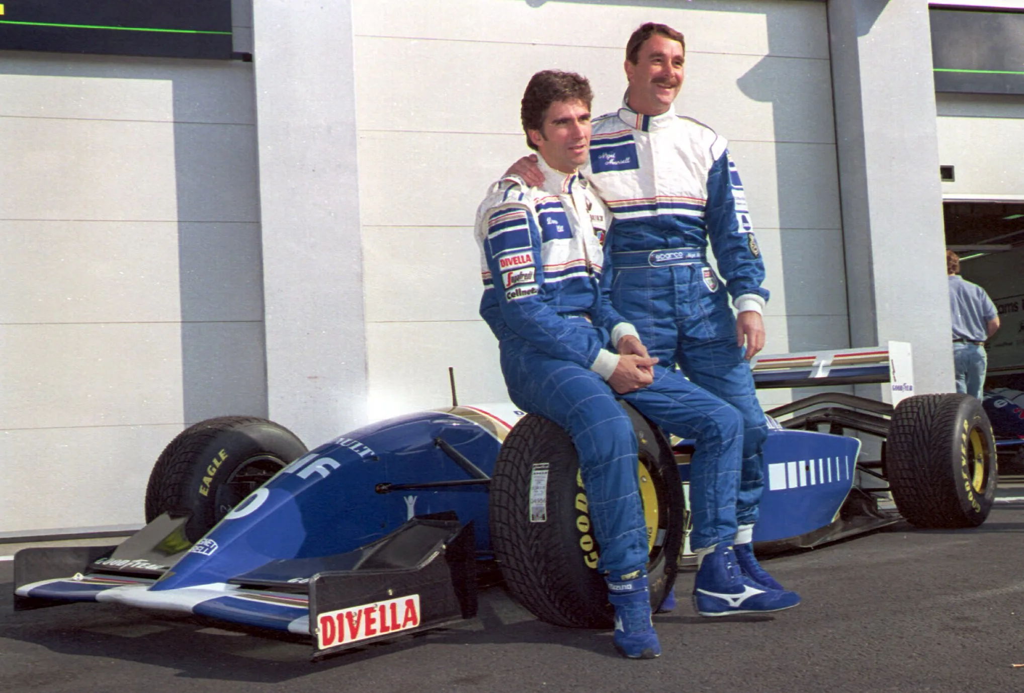 1 JUL 1994: NIGEL MANSELL AND DAMON HILL, BOTH OF GREAT BRITAIN, POSE WITH THEIR WILLIAMS RENAULT