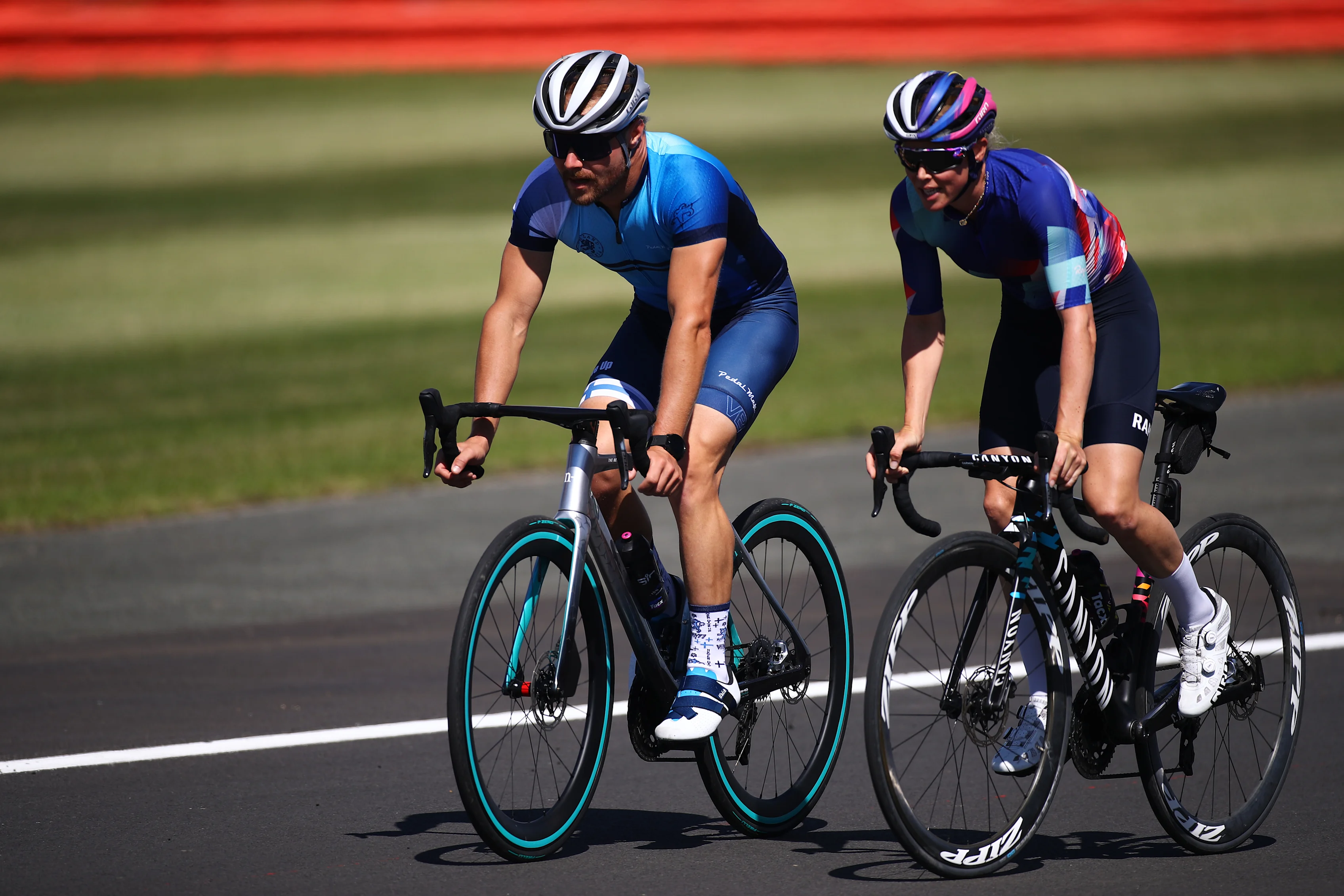 NORTHAMPTON, ENGLAND - JULY 30: Valtteri Bottas of Finland and Mercedes GP and girlfriend and road