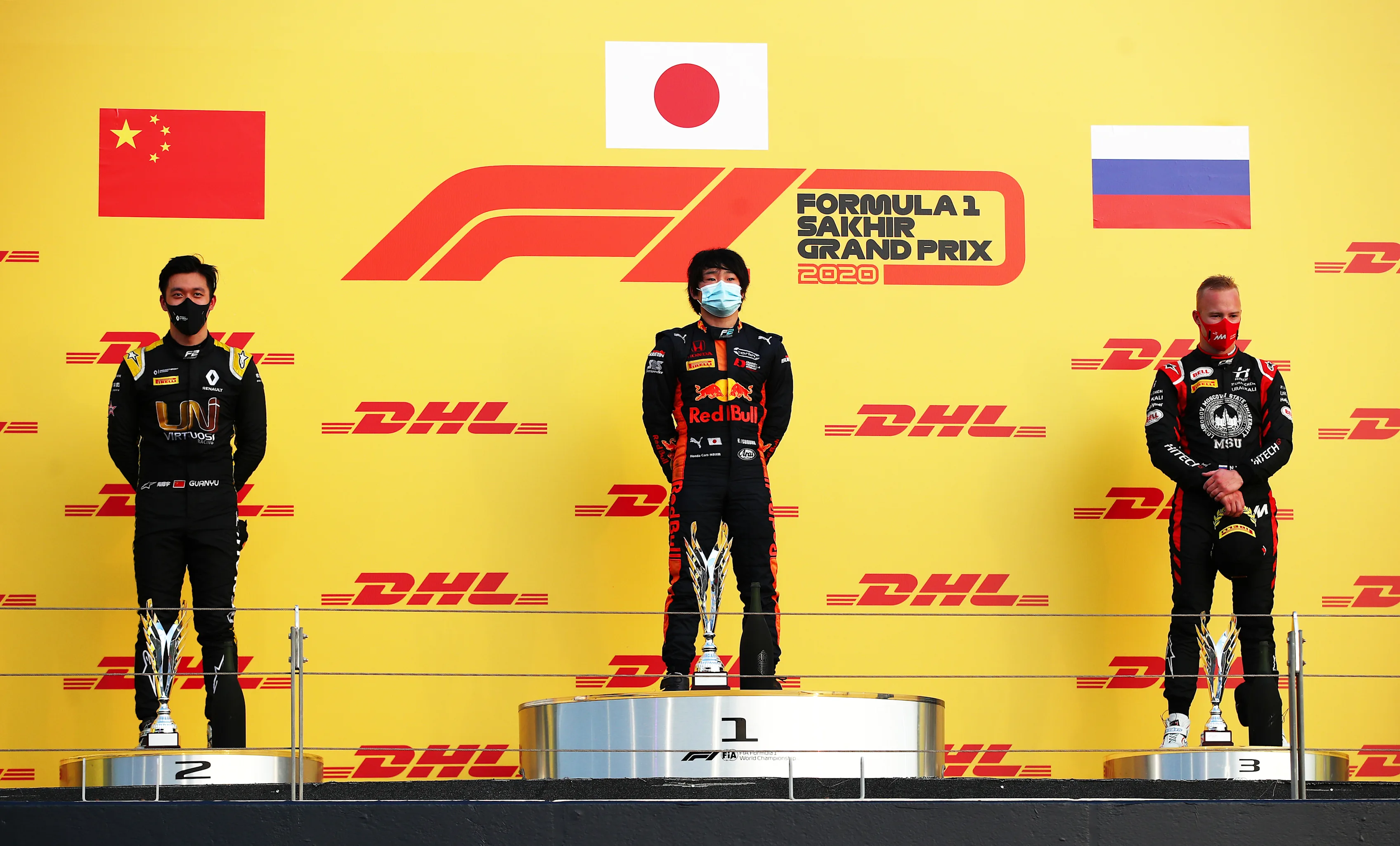 BAHRAIN, BAHRAIN - DECEMBER 05: Race winner Yuki Tsunoda of Japan and Carlin (centre), second