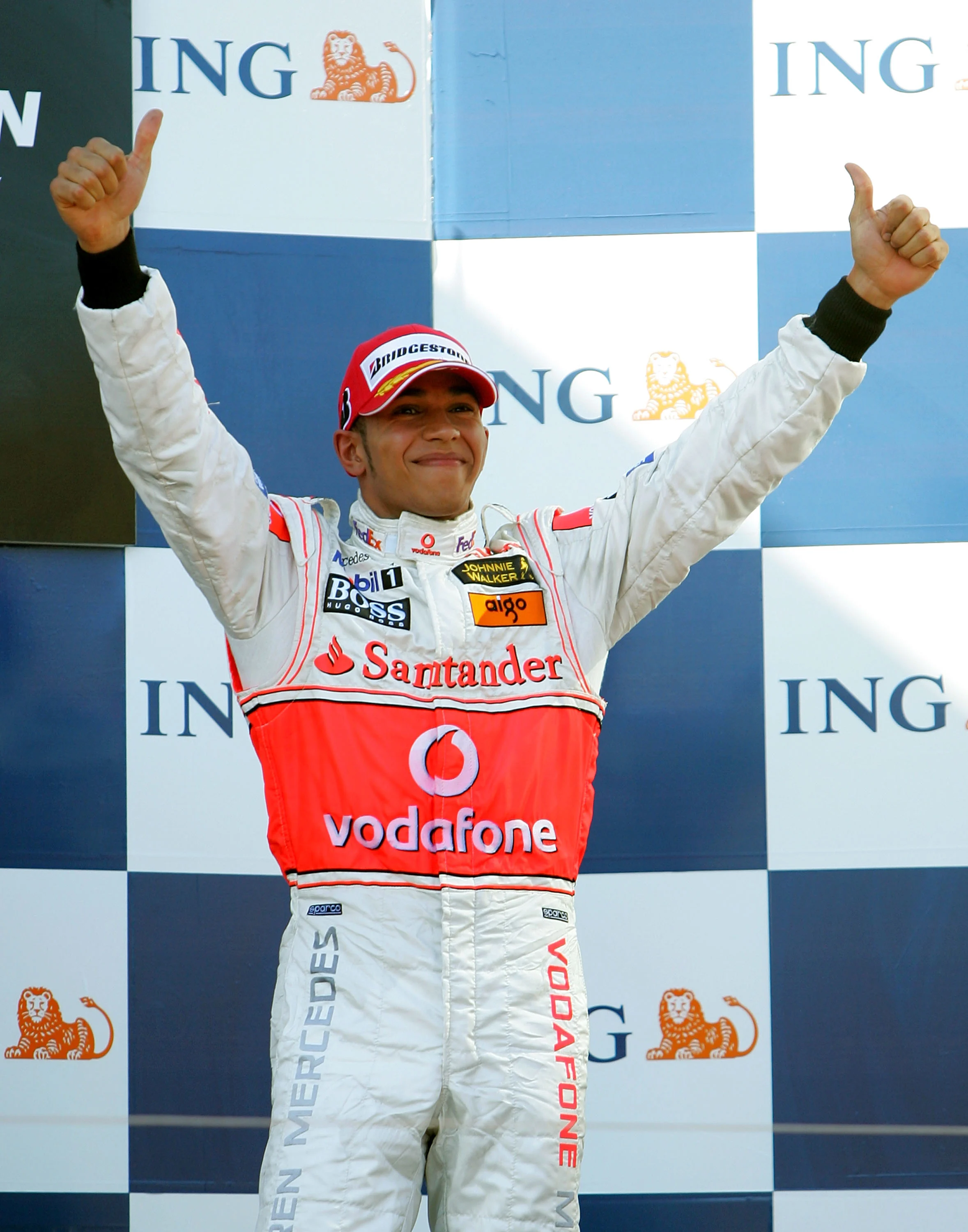 MELBOURNE, AUSTRALIA - MARCH 18: Lewis Hamilton of Great Britain and McLaren Mercedes celebrates