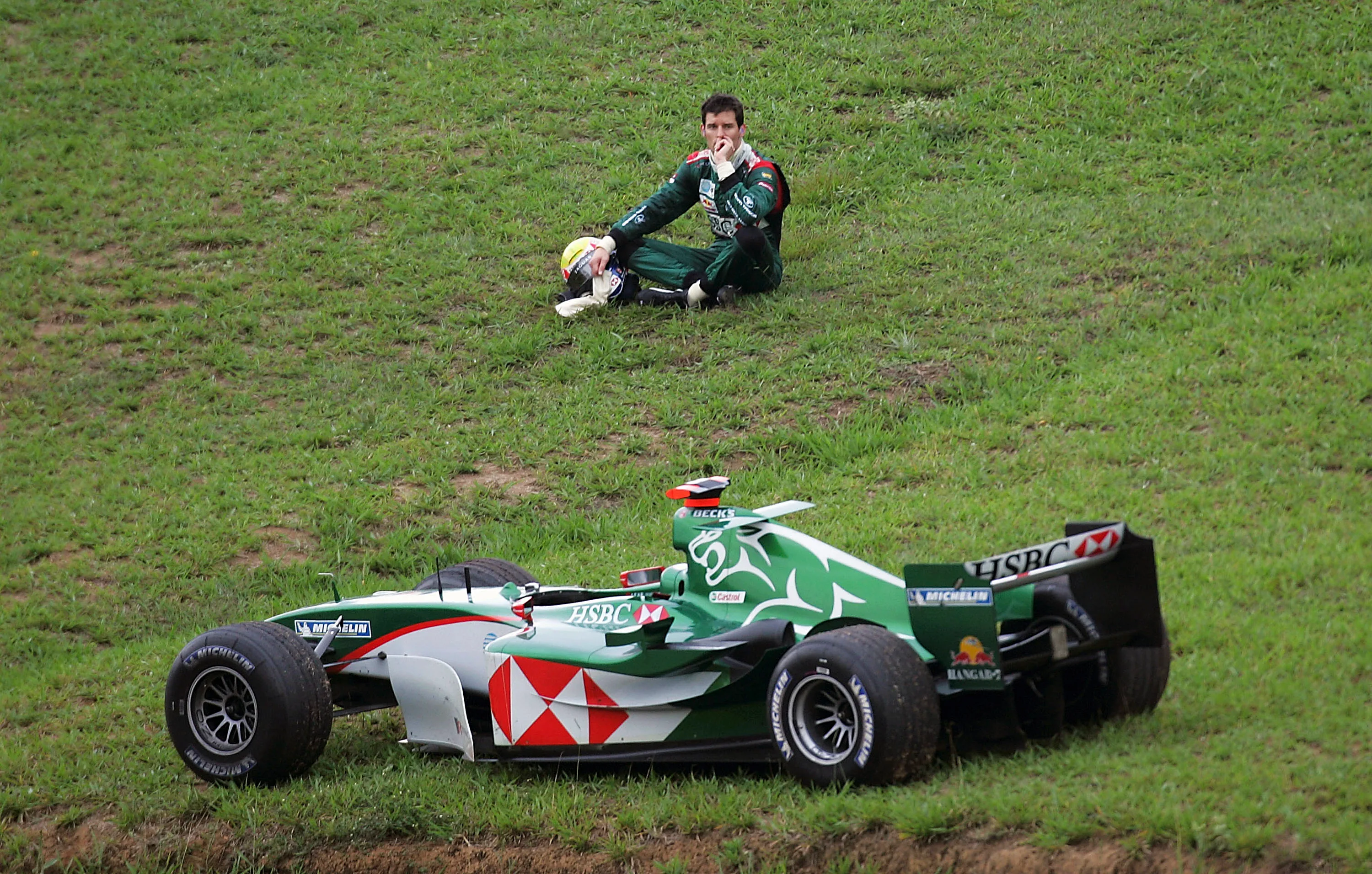 SAO PAULO, BRAZIL - OCTOBER 24: Mark Webber of Australia and Jaguar watches the race after