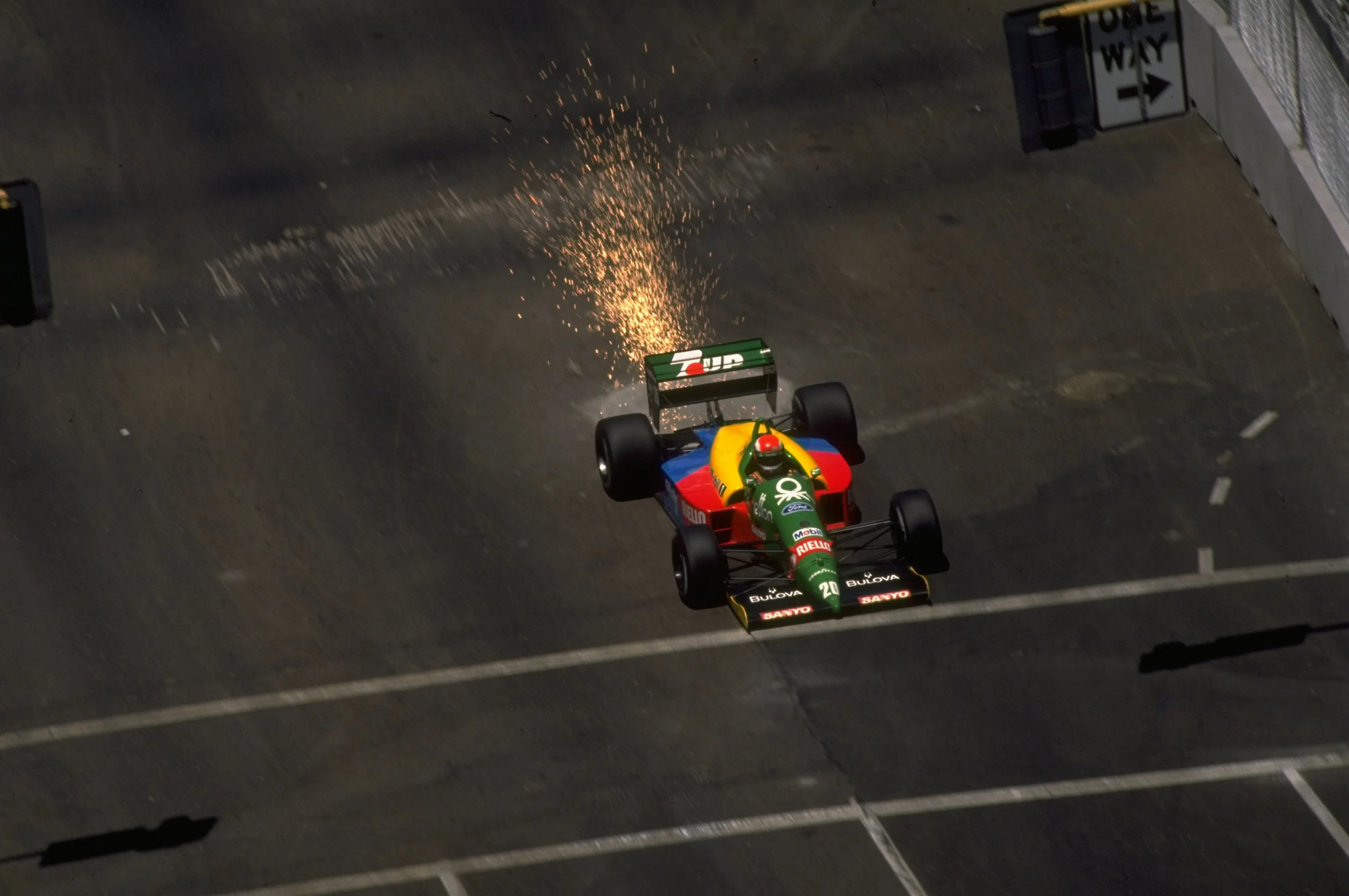 1989: Johnny Herbert of Great Britain sets sparks flying in his Benetton Cosworth during the