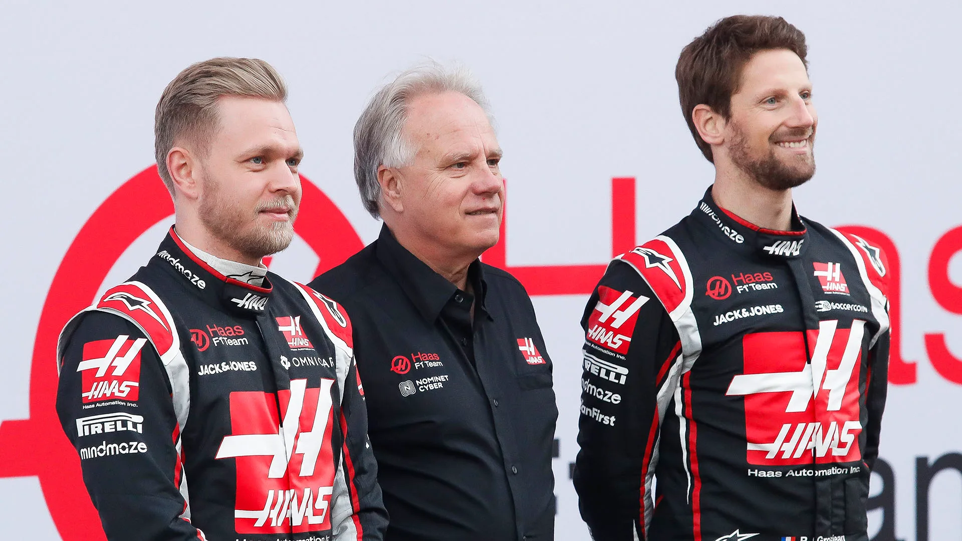 BARCELONA, SPAIN - FEBRUARY 19: Kevin Magnussen of Denmark and Haas F1 Team , Gene Haas and Romain