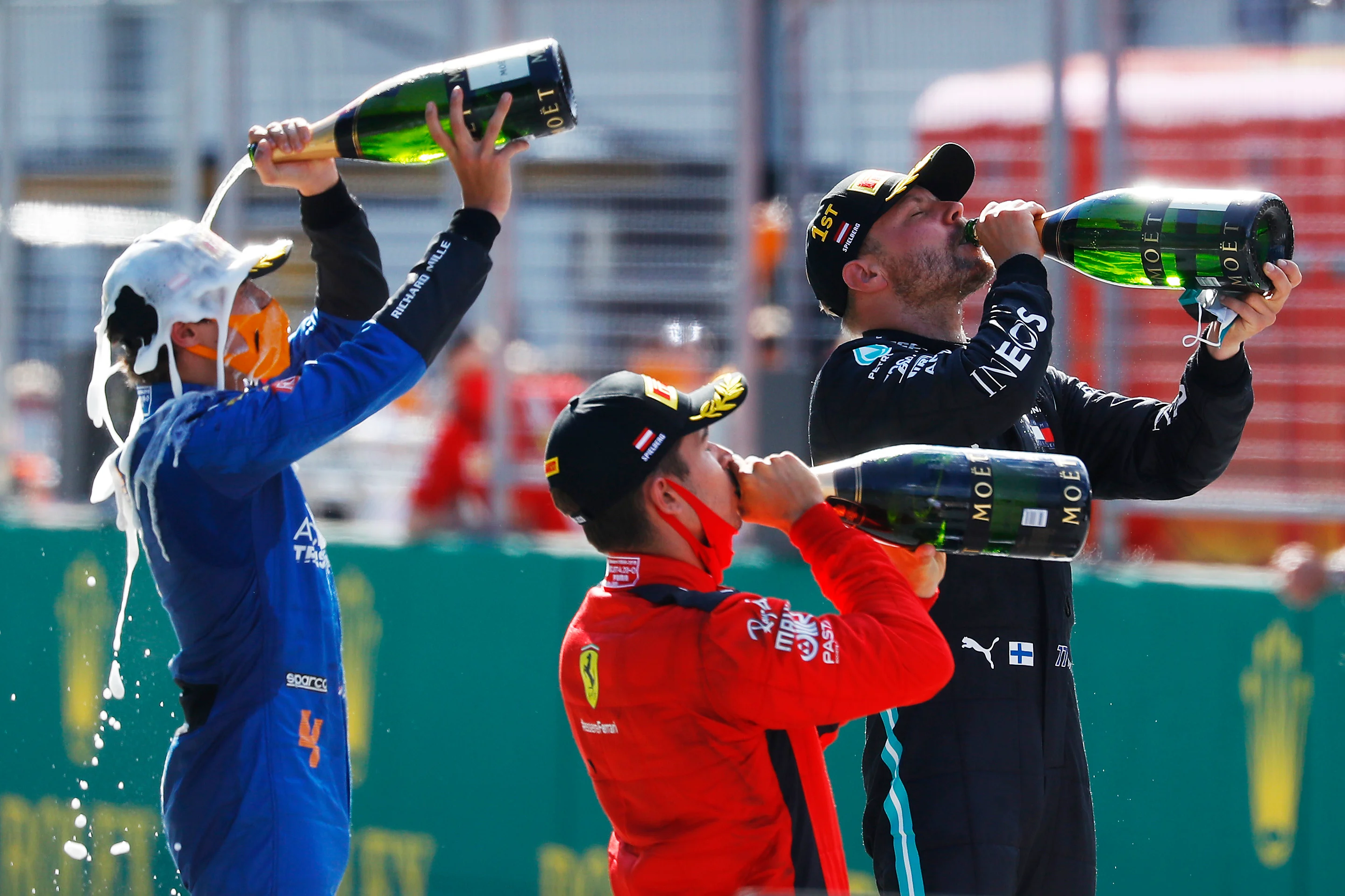 SPIELBERG, AUSTRIA - JULY 05: Race winner Valtteri Bottas of Finland and Mercedes GP, second placed