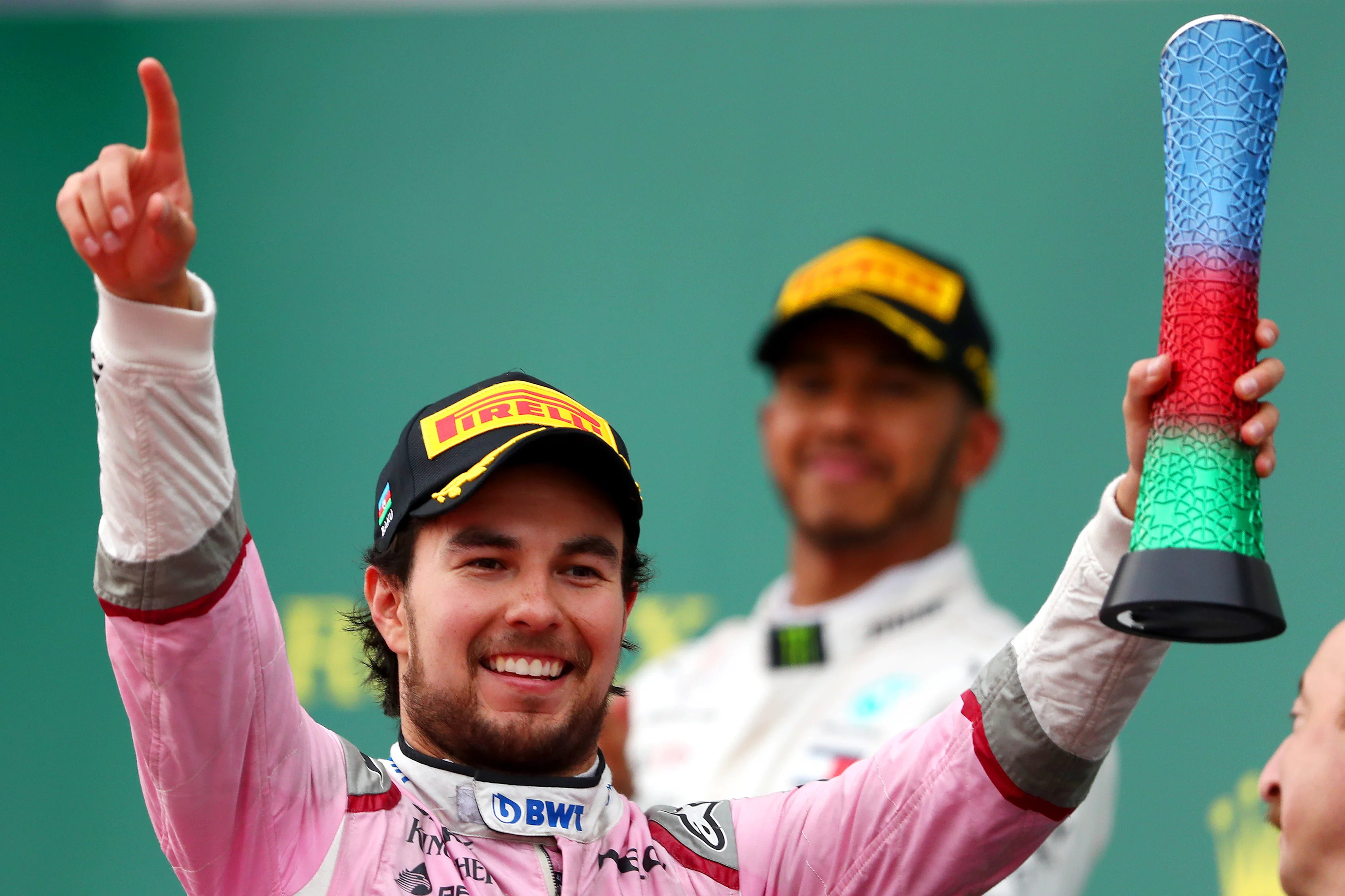 BAKU, AZERBAIJAN - APRIL 29: Third place finisher Sergio Perez of Mexico and Force India