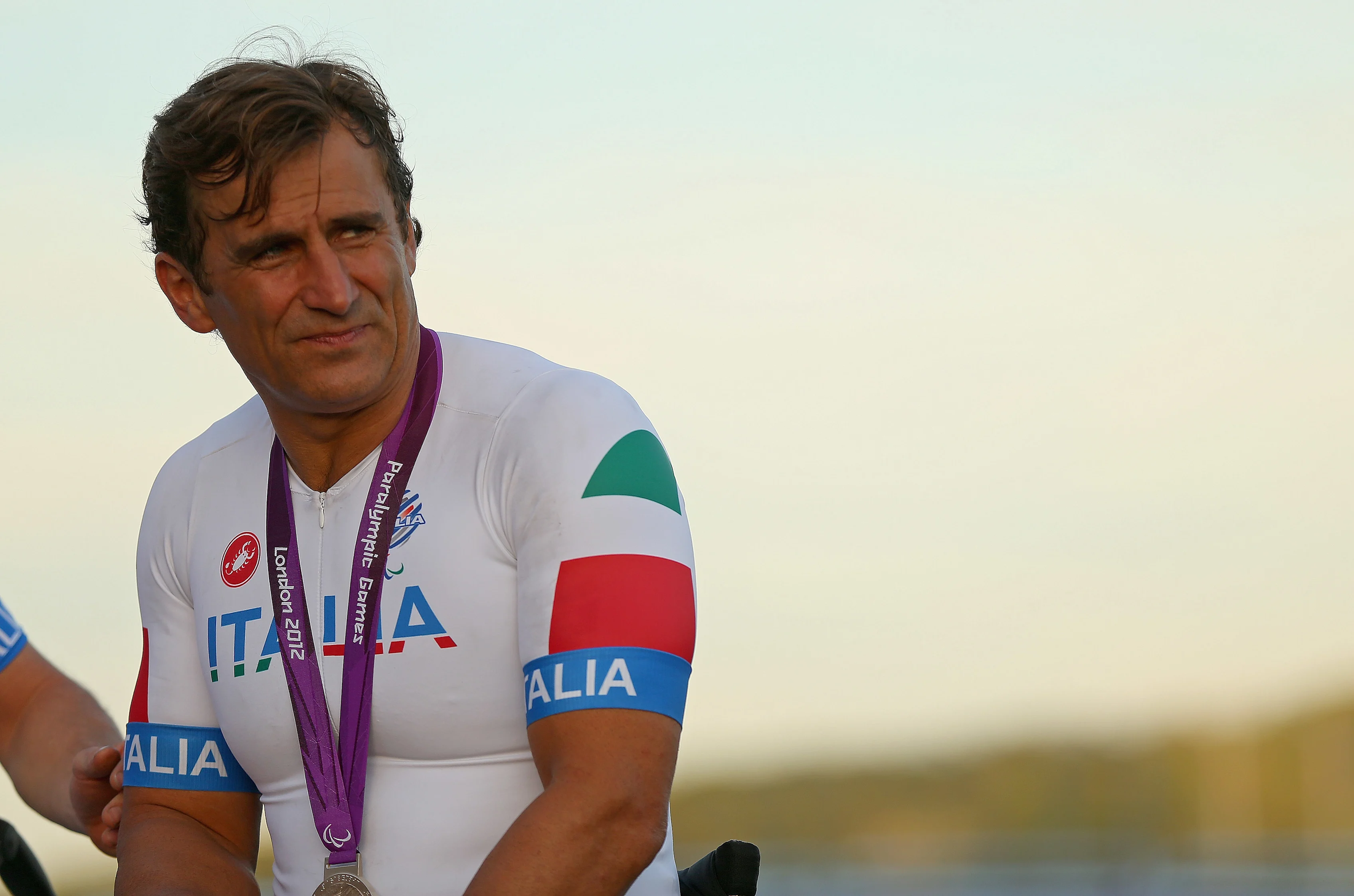 LONGFIELD, ENGLAND - SEPTEMBER 08: Alessandro Zanardi of Italy celebrates winning the Silver Medal