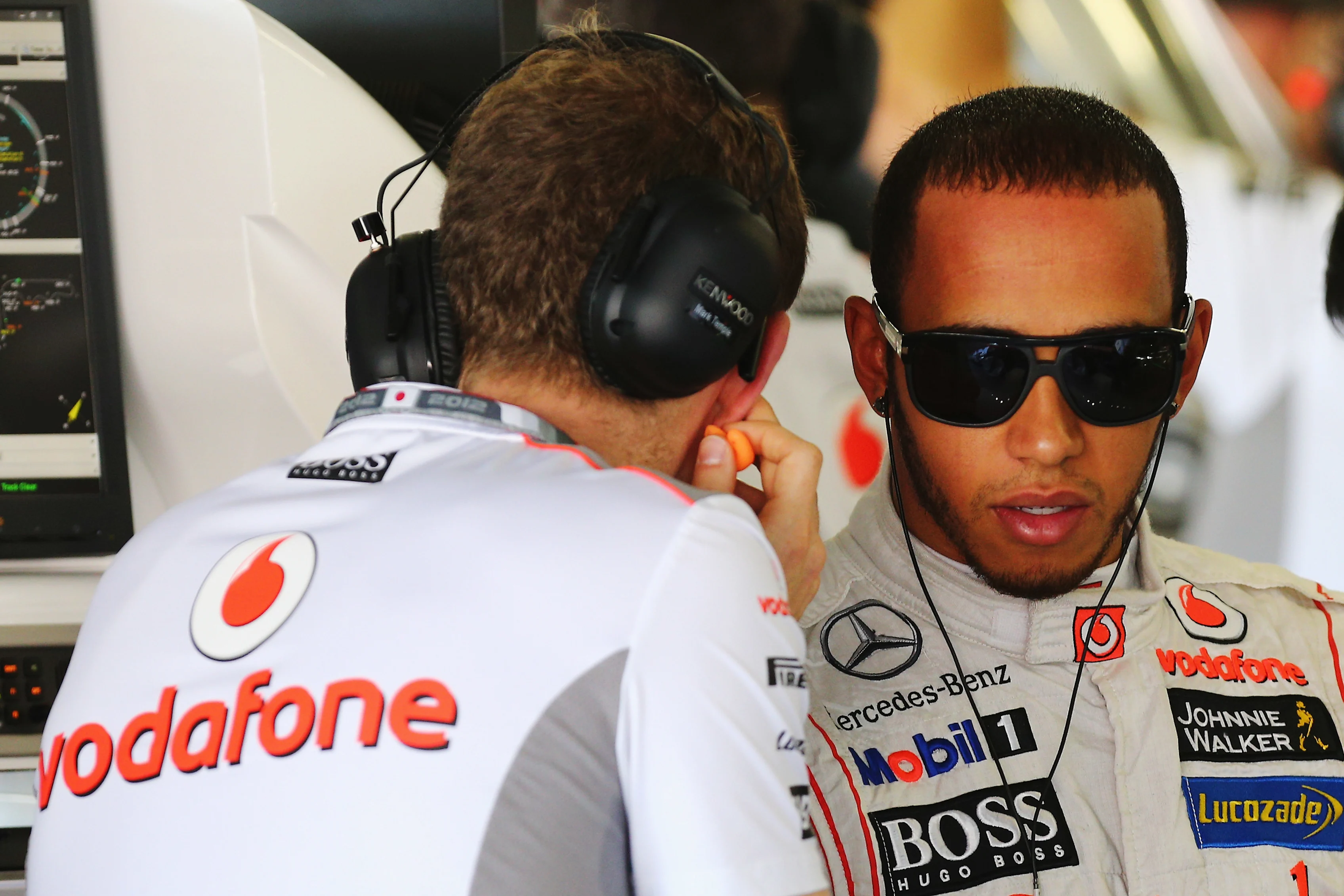 SUZUKA, JAPAN - OCTOBER 05: Lewis Hamilton of Great Britain and McLaren talks with his performance