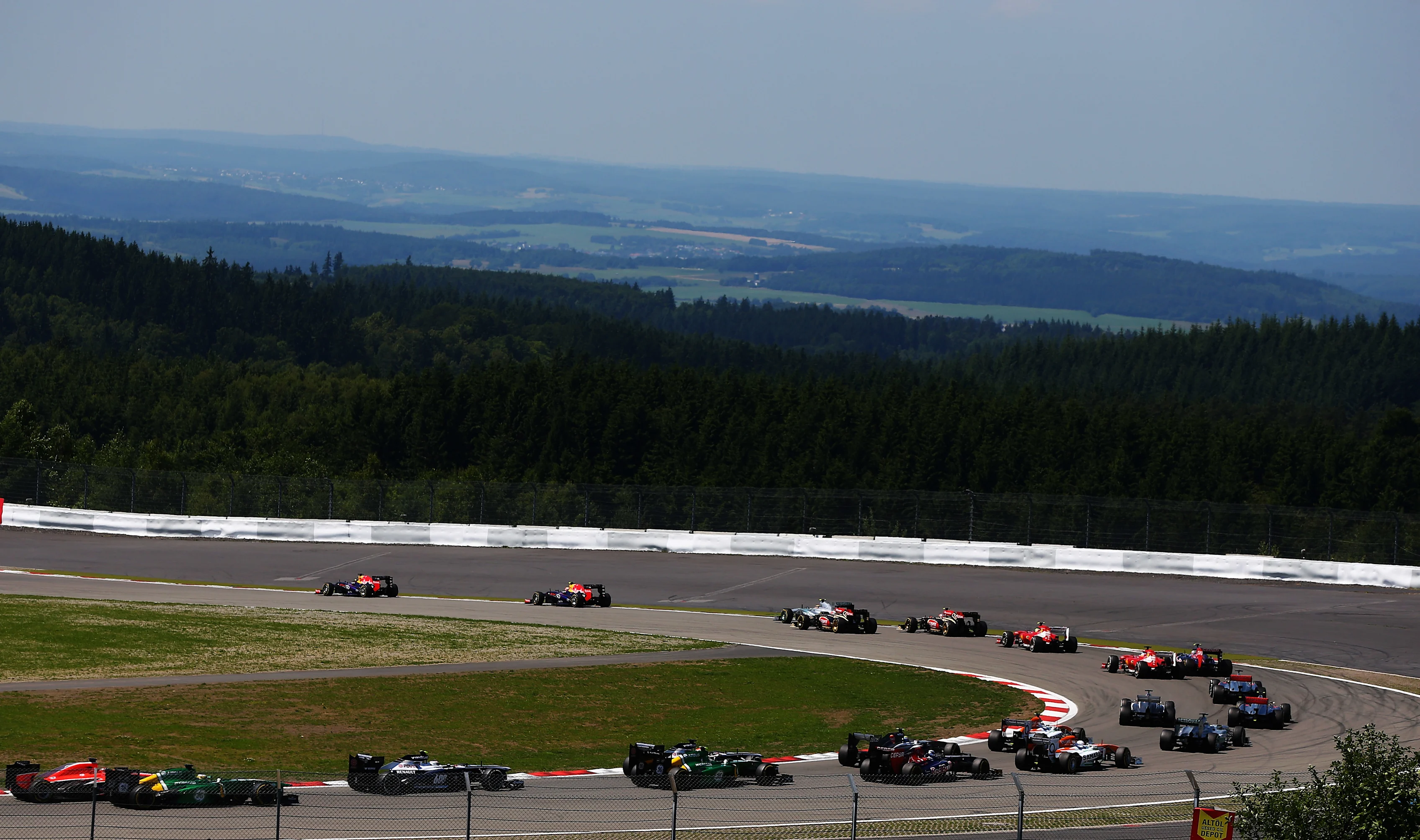 NUERBURG, GERMANY - JULY 07:  Sebastian Vettel of Germany and Infiniti Red Bull Racing and Mark