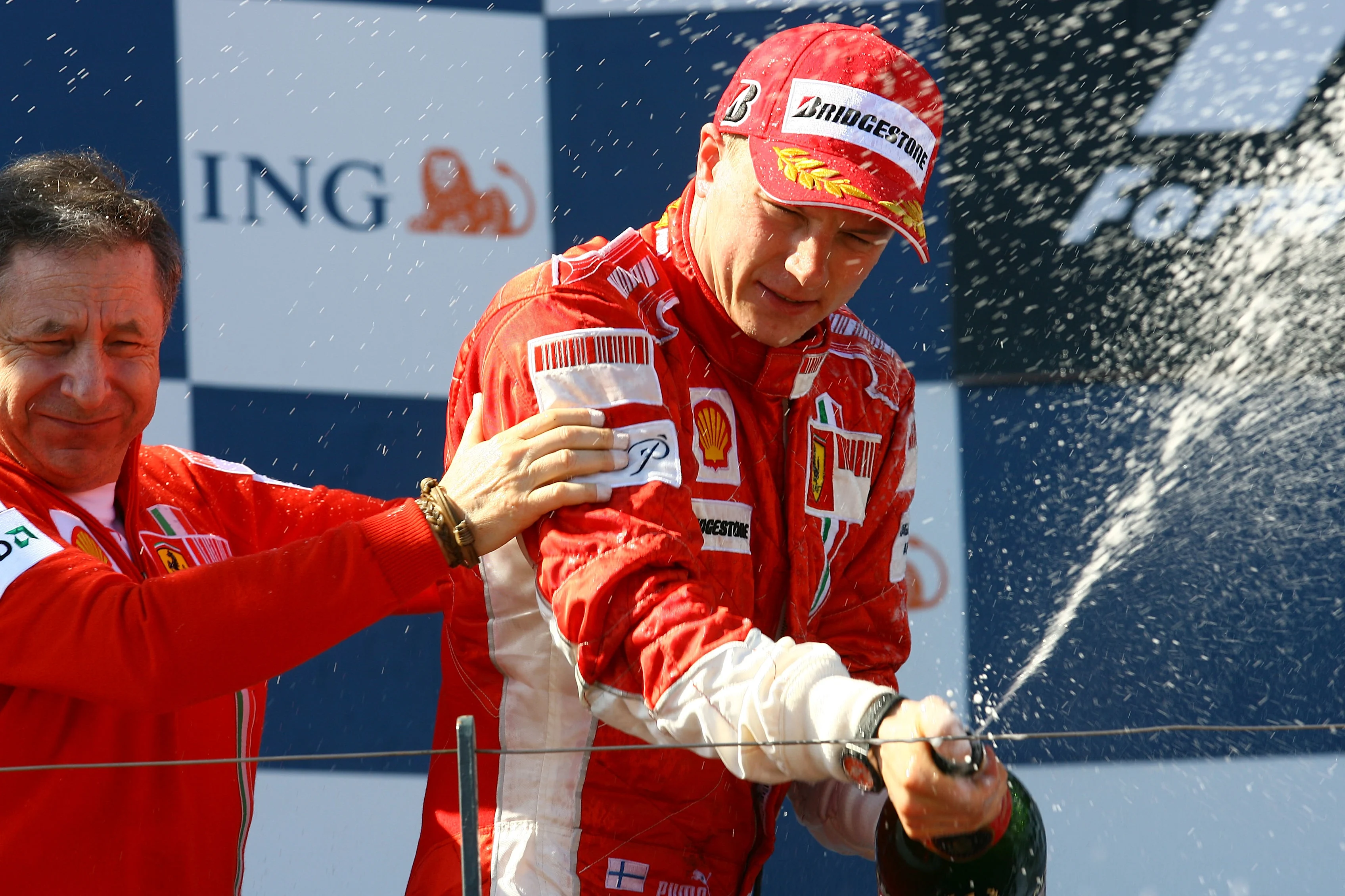 MELBOURNE, AUSTRALIA - MARCH 18: Kimi Raikkonen of Finland and Ferrari celebrates with Ferrari