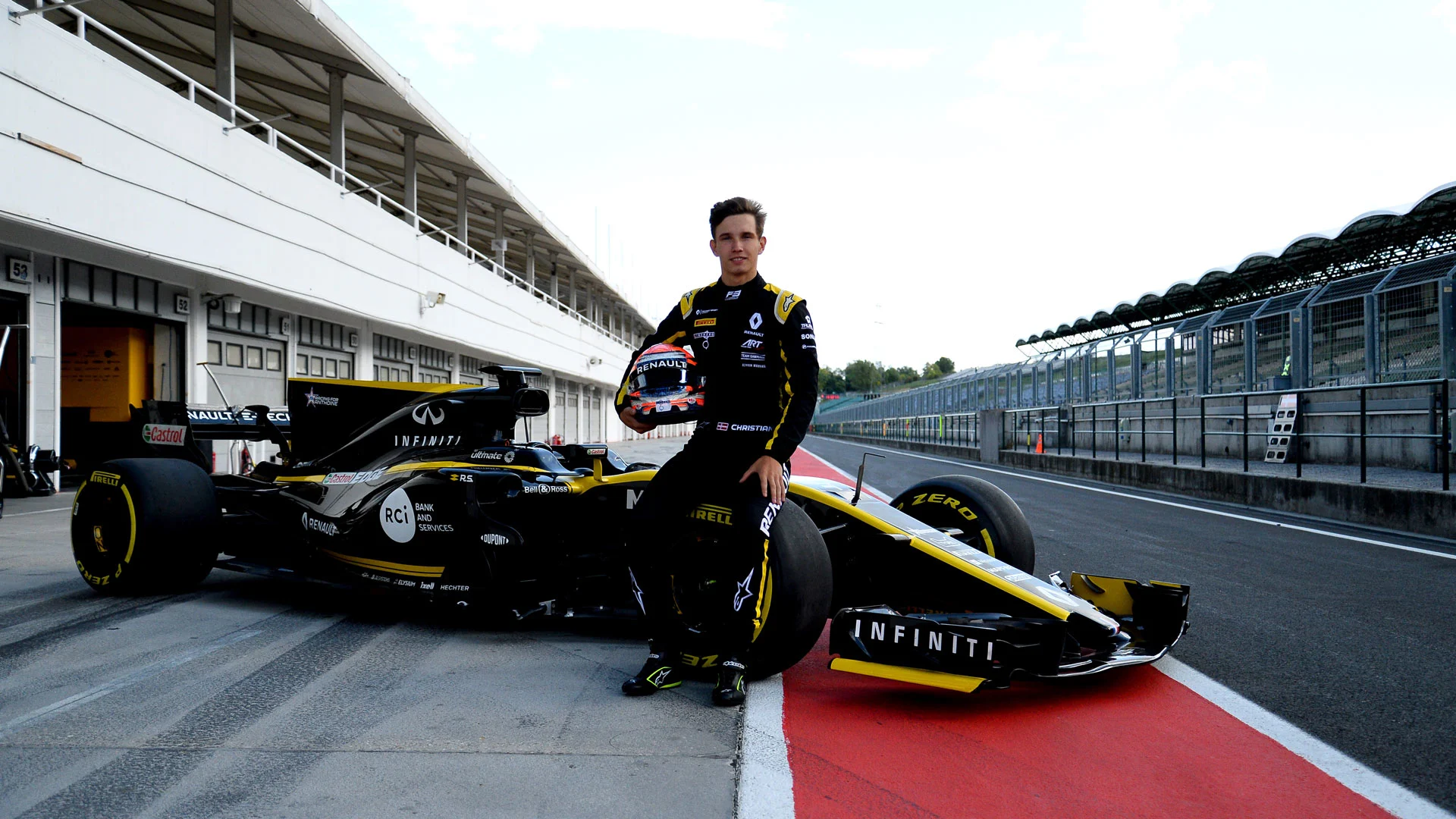 Christian Lundgaard (Renault R.S. 17) in front of his car during his first Formula 1 test at the