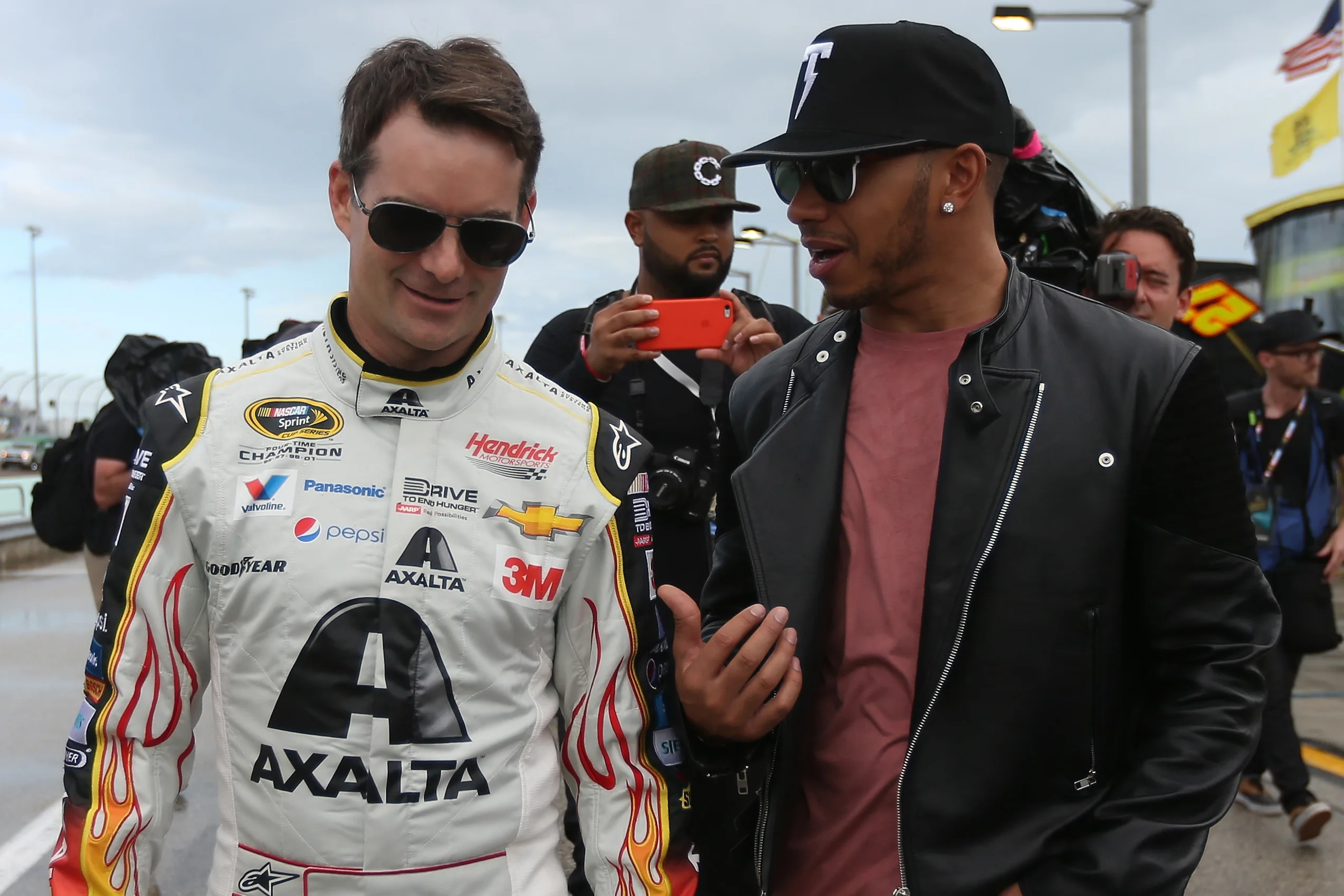 HOMESTEAD, FL - NOVEMBER 22: Jeff Gordon, driver of the #24 AXALTA Chevrolet, walks with Formula