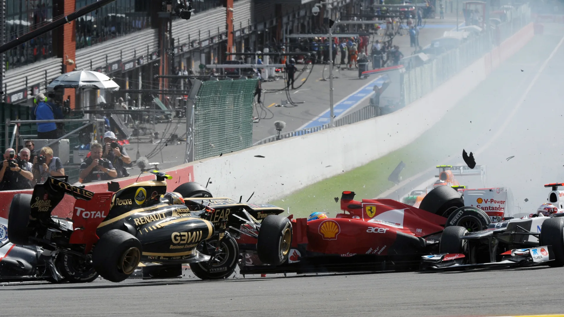 Lotus F1 Team's French driver Romain Grosjean (L) and Ferrari's Spanish driver Fernando Alonso