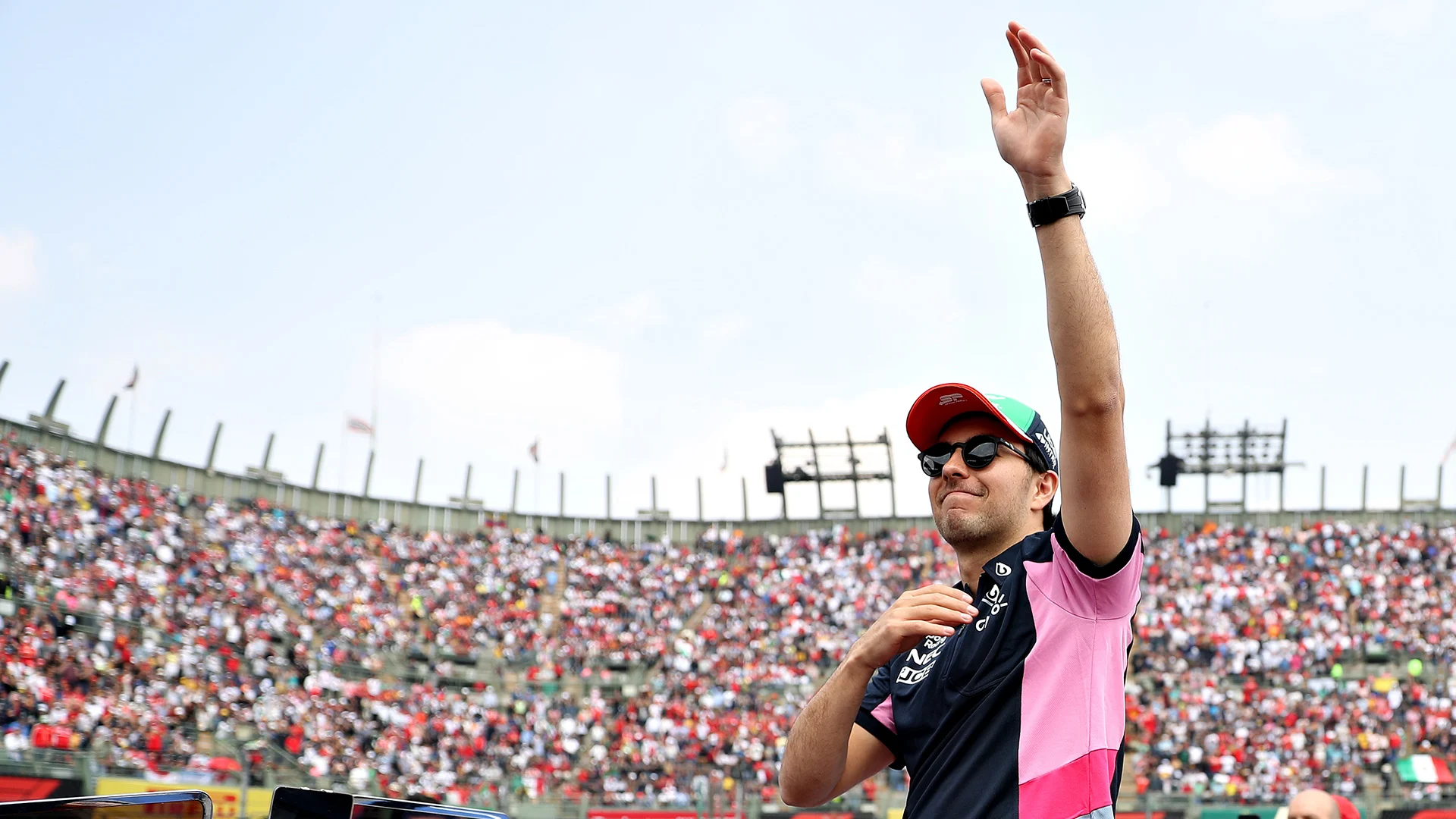 MEXICO CITY, MEXICO - OCTOBER 27: Sergio Perez of Mexico and Racing Point waves to the crowd on the