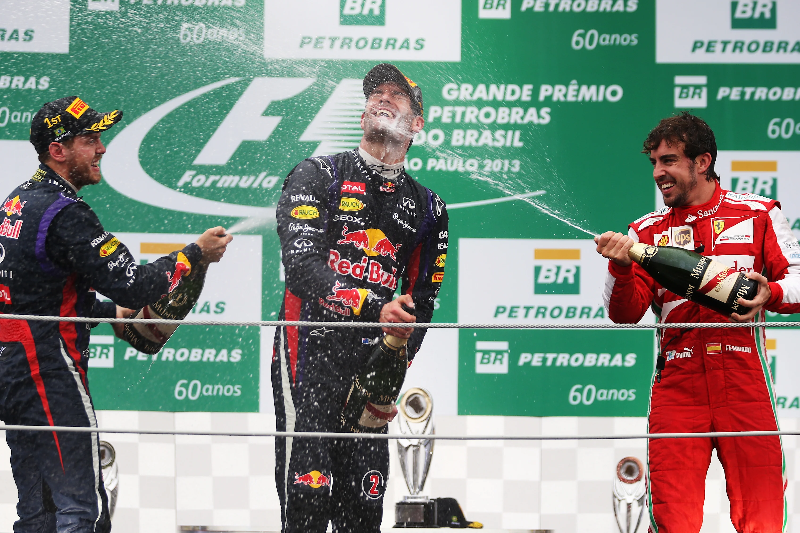 SAO PAULO, BRAZIL - NOVEMBER 24: Race winner Sebastian Vettel (L) of Germany and Infiniti Red Bull