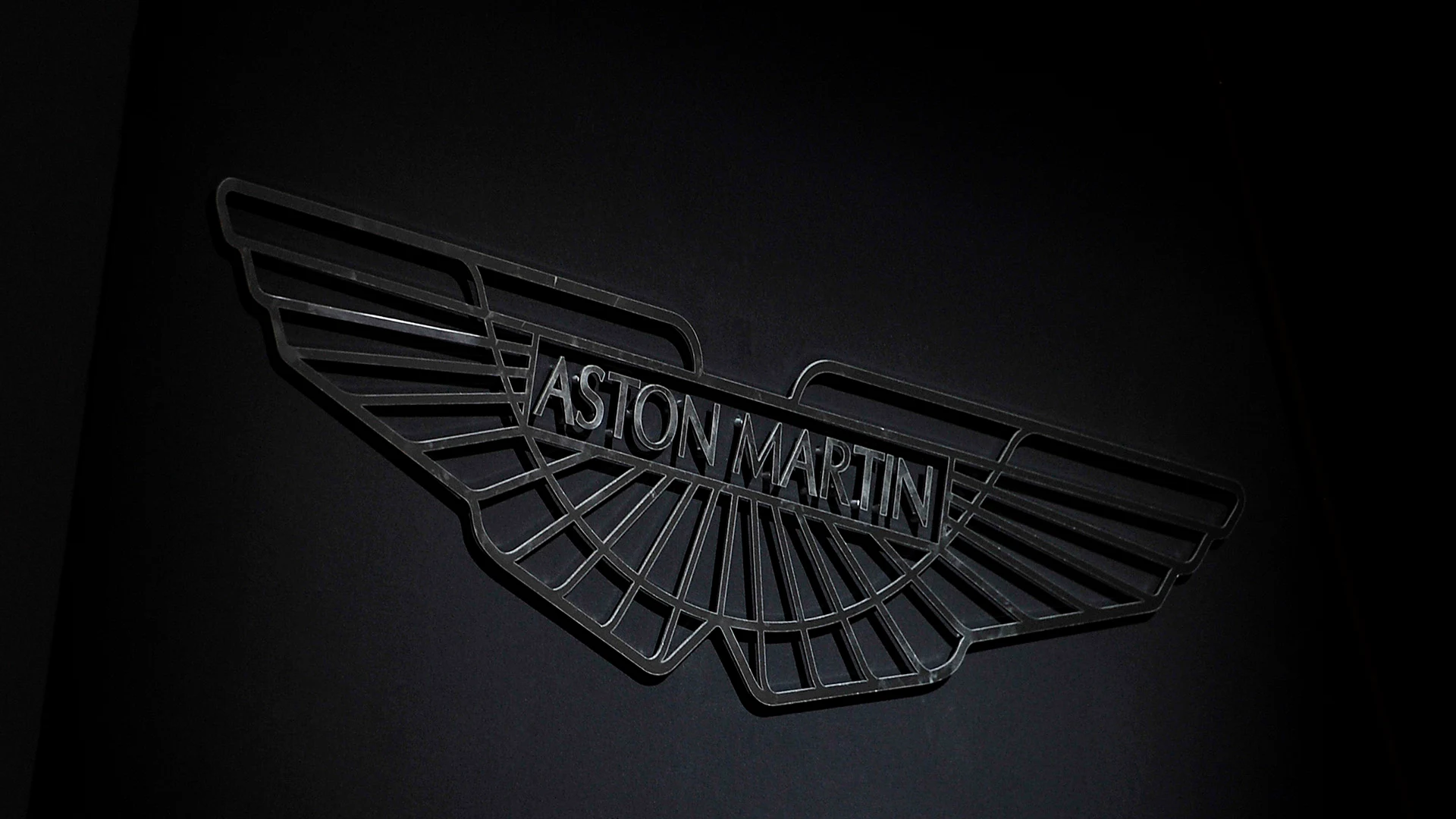 GENEVA, SWITZERLAND - MARCH 03: An Aston Martin logo is shown during the 85th International Motor