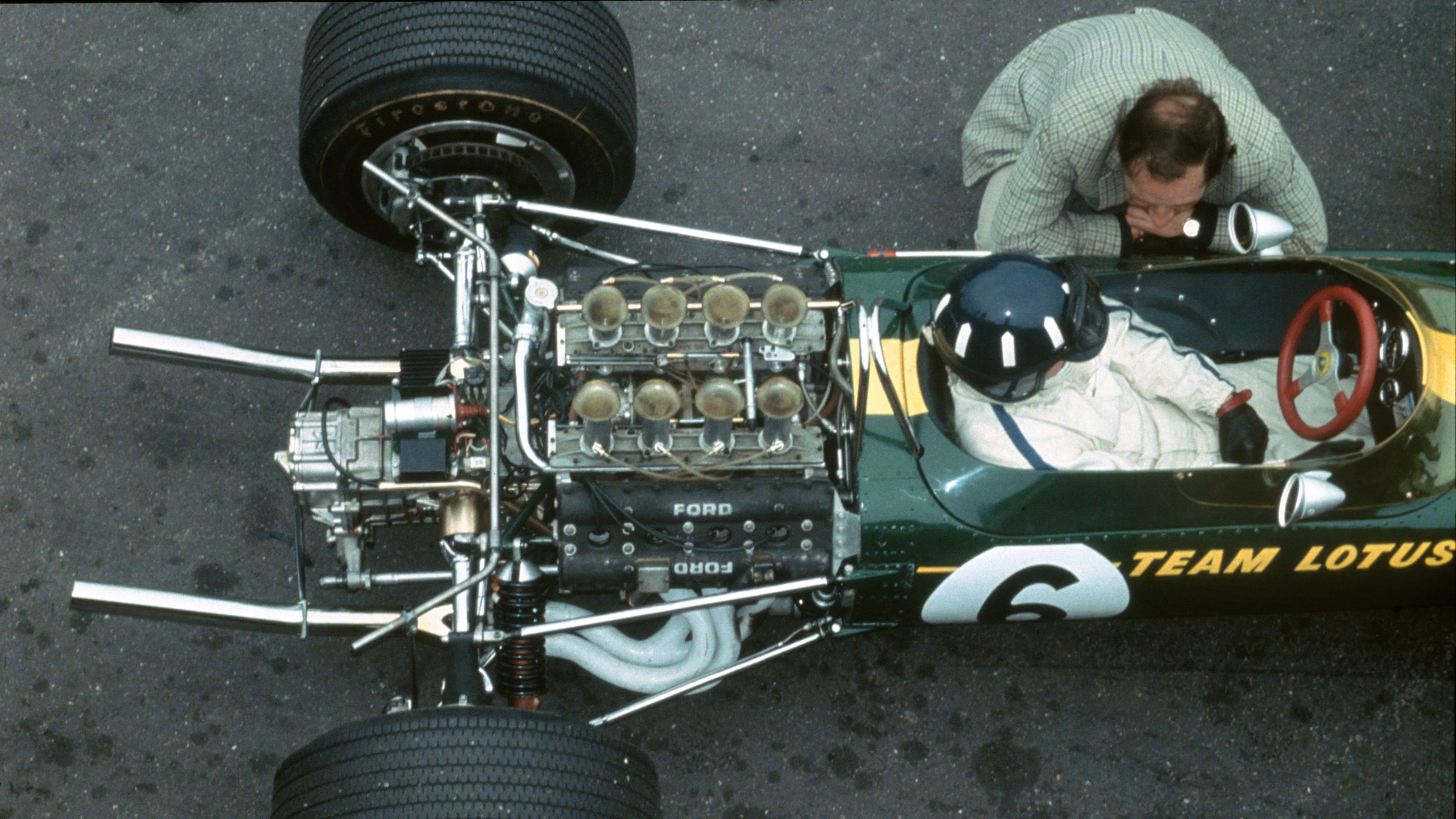 Zandvoort, Holland.
2-4 June 1967.
Graham Hill (Lotus 49 Ford). The new Ford Cosworth DFV V8