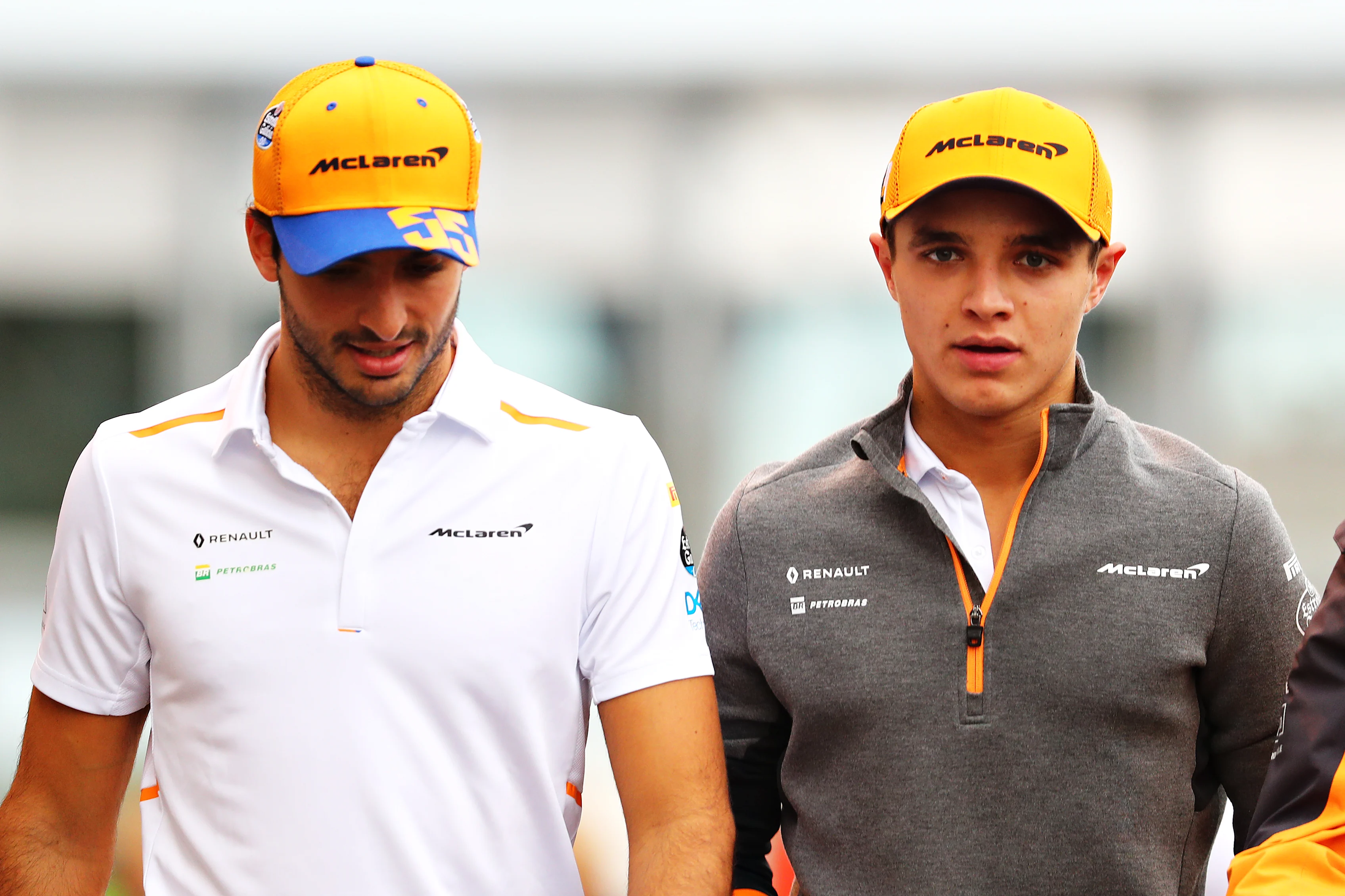 SUZUKA, JAPAN - OCTOBER 11: Carlos Sainz of Spain and McLaren F1 and Lando Norris of Great Britain