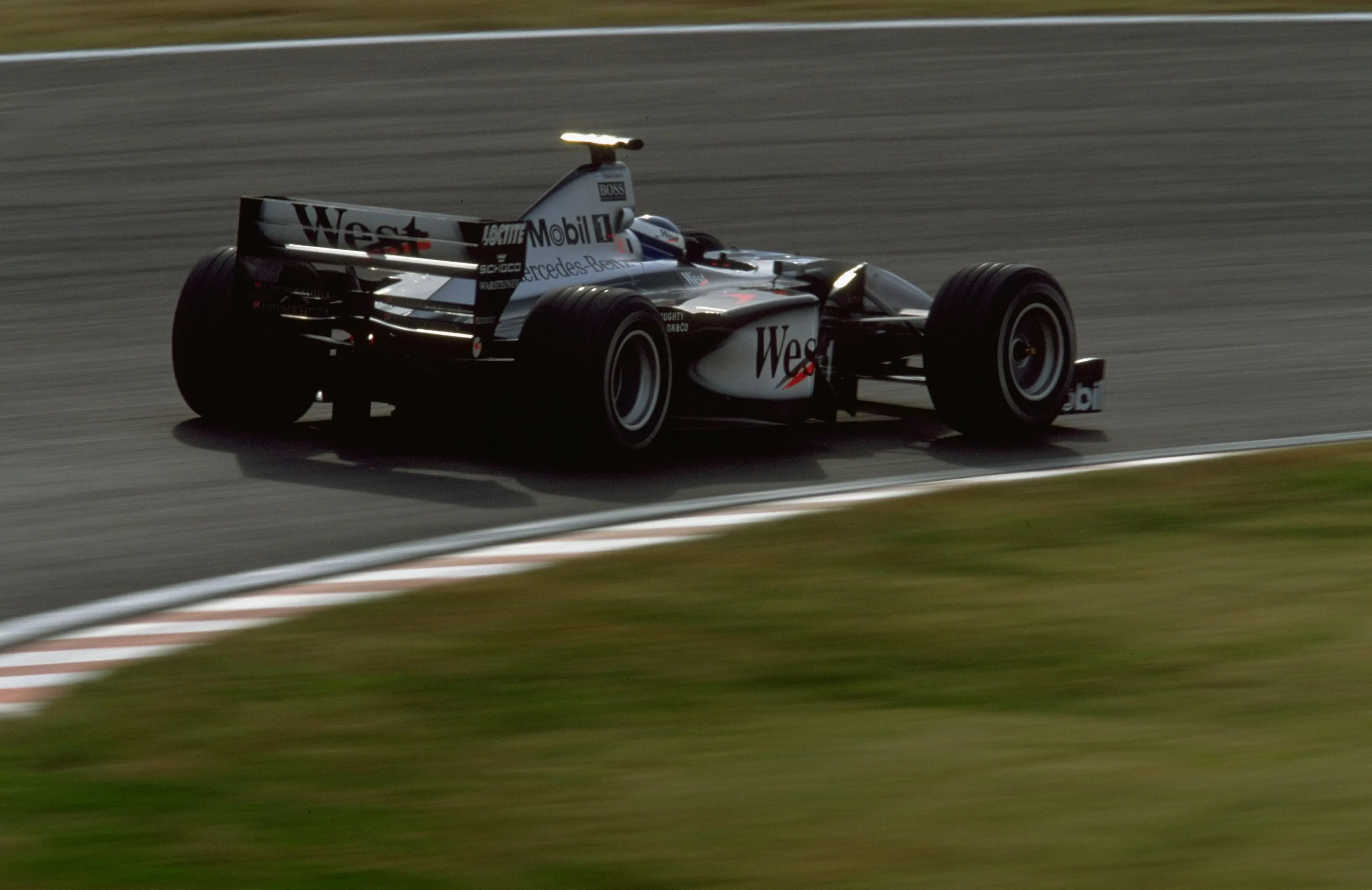 31 Oct 1999: Mika Hakkinen of Finland and McLaren-Mercedes in action during the Japanese Formula