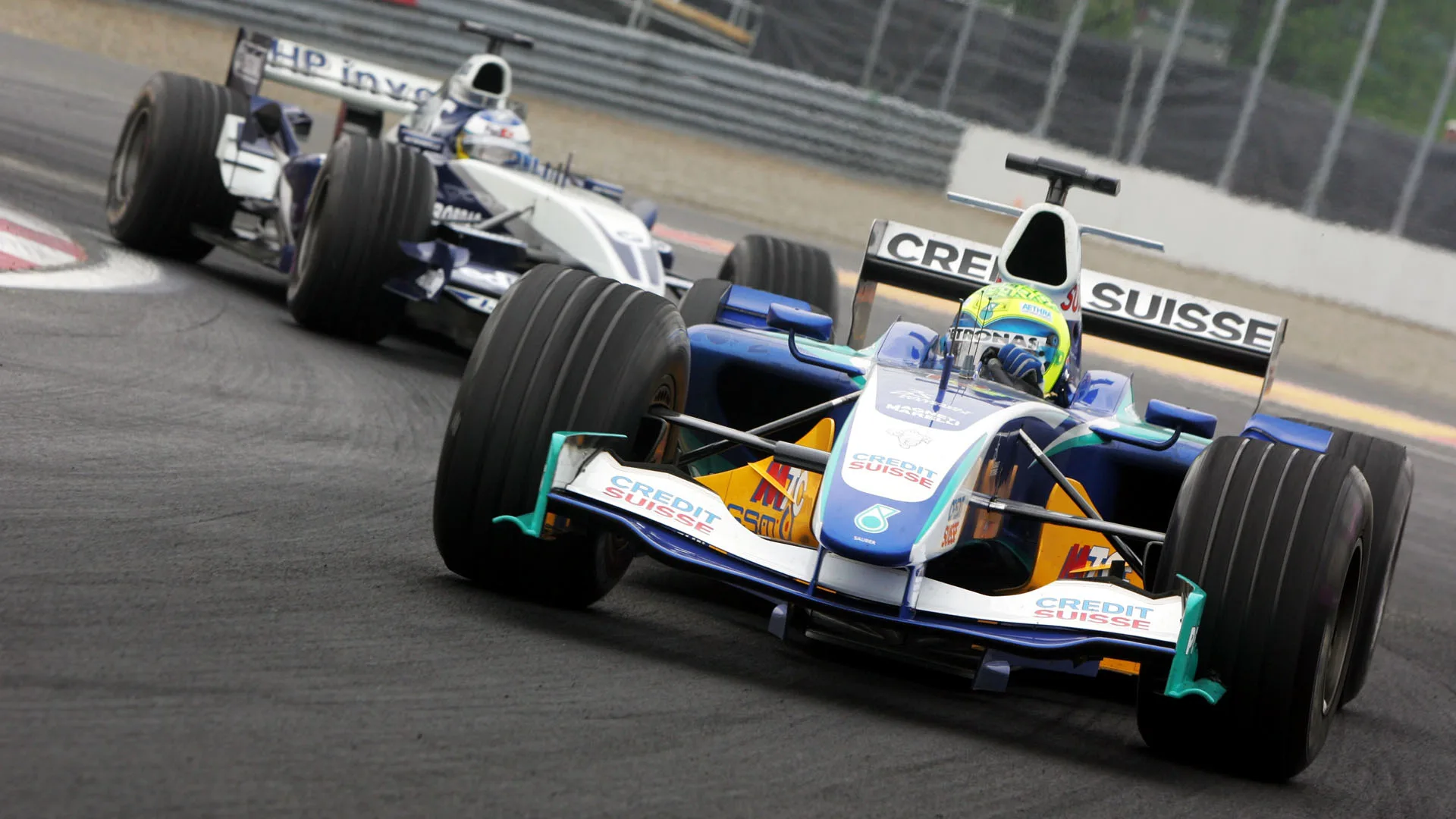 Felipe Massa (BRA) Sauber Petronas C24 leads Nick Heidfeld (GER) Williams BMW FW27 Formula One
