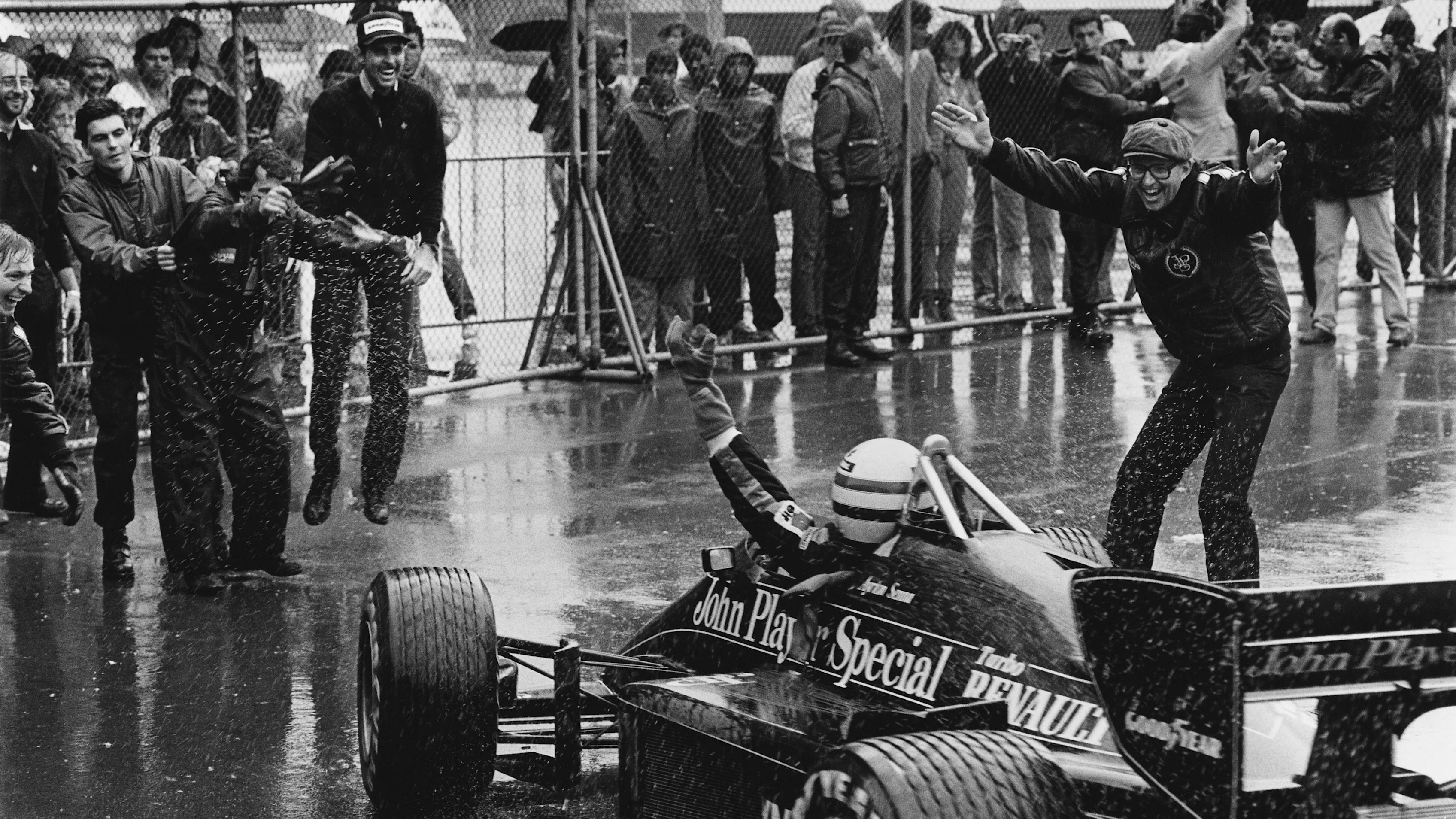 Estoril, Portugal. 19-21 April 1985.
Ayrton Senna (Lotus 97T-Renault) celebrates 1st position with