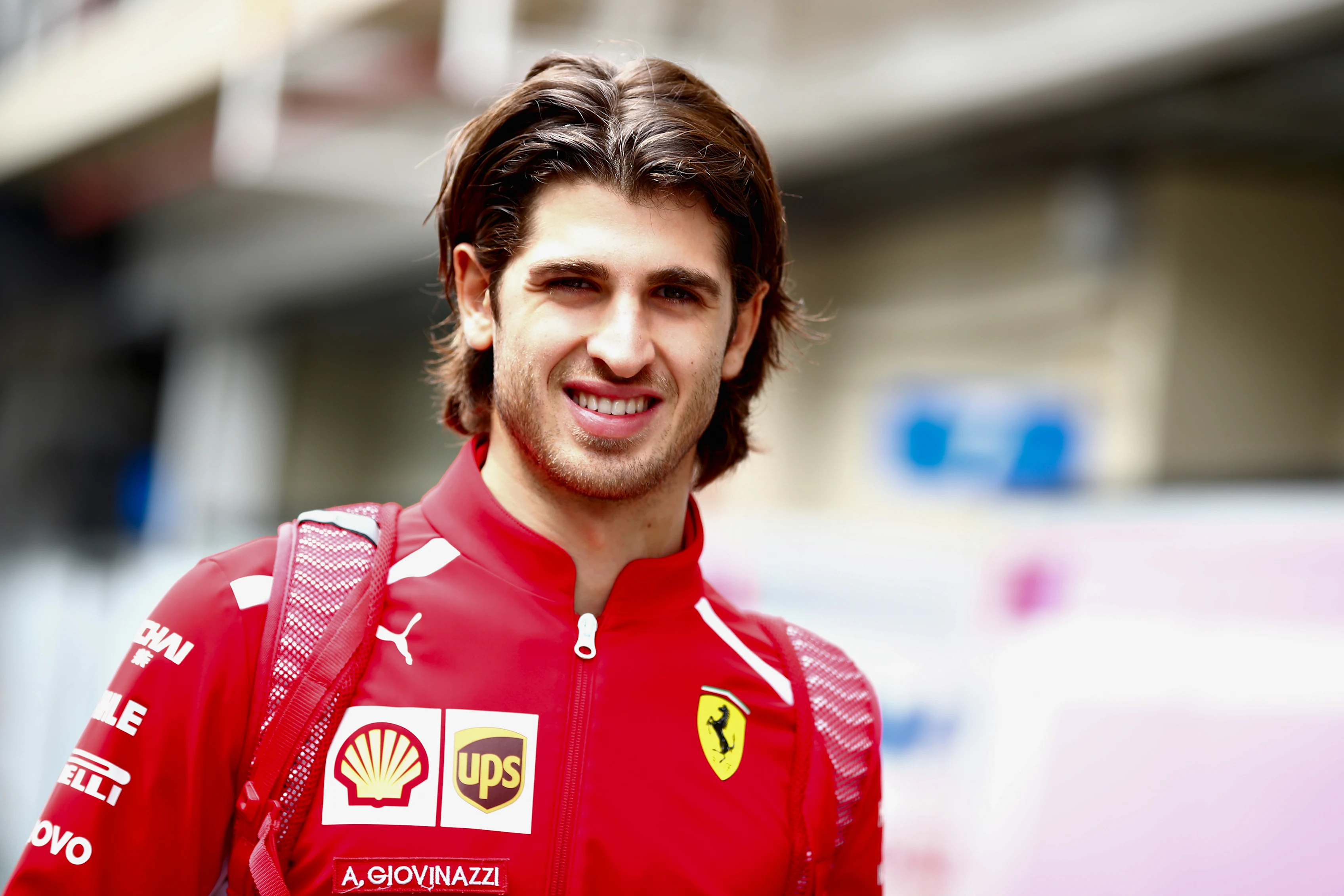 SAO PAULO, BRAZIL - NOVEMBER 10: Antonio Giovinazzi of Italy and Ferrari walks in the Paddock