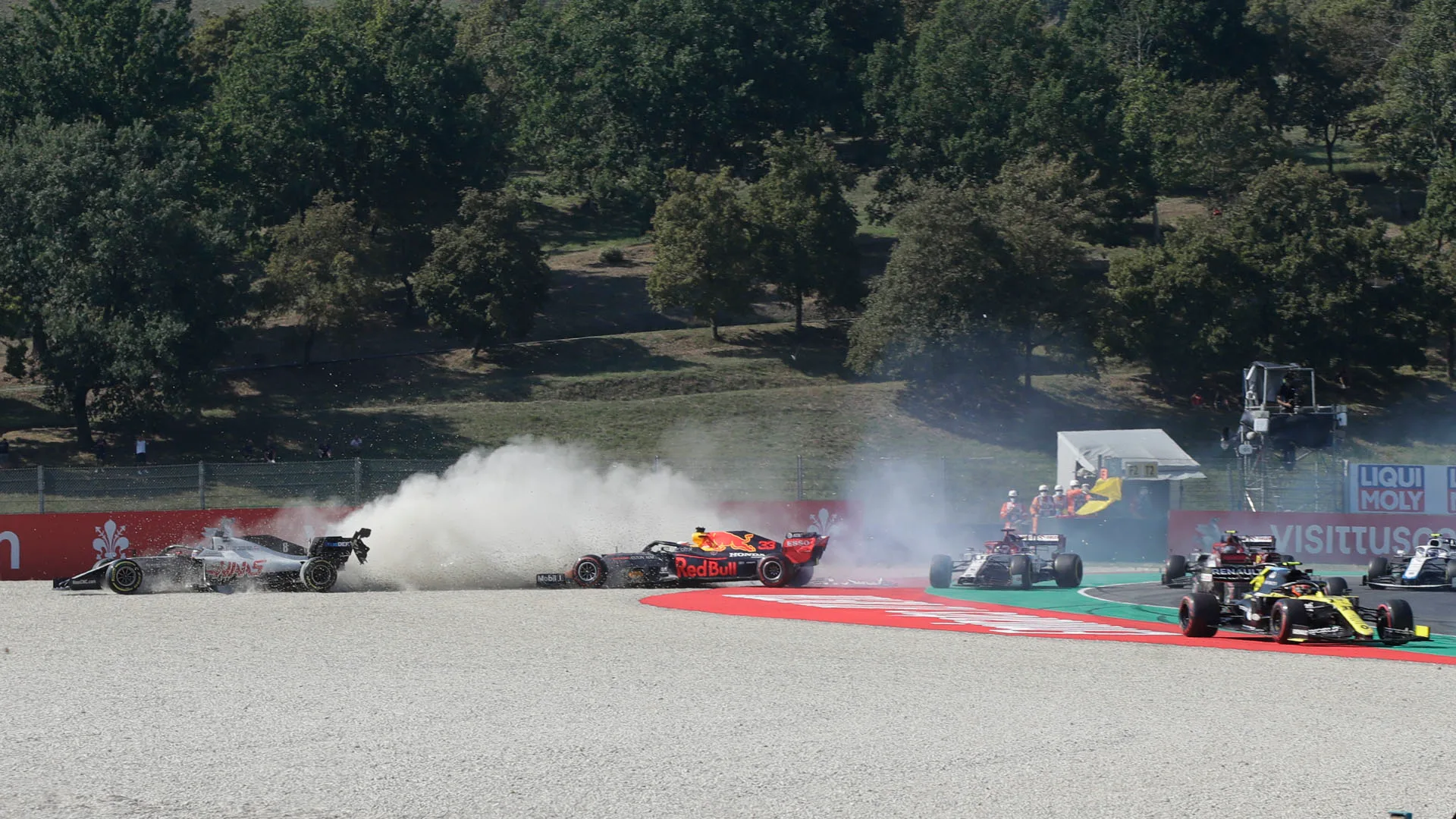 Haas driver Romain Grosjean of France, left, and Red Bull driver Max Verstappen of the Netherlands