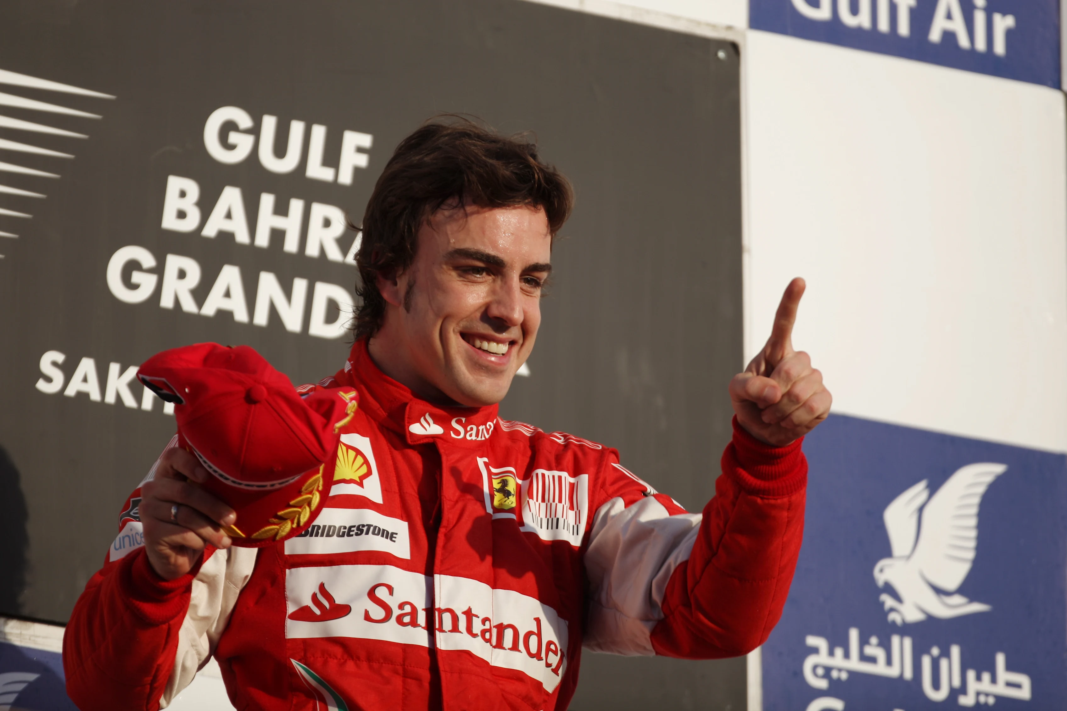 Race winner Fernando Alonso (ESP) Ferrari on the podium. Formula One World Championship, Rd 1,