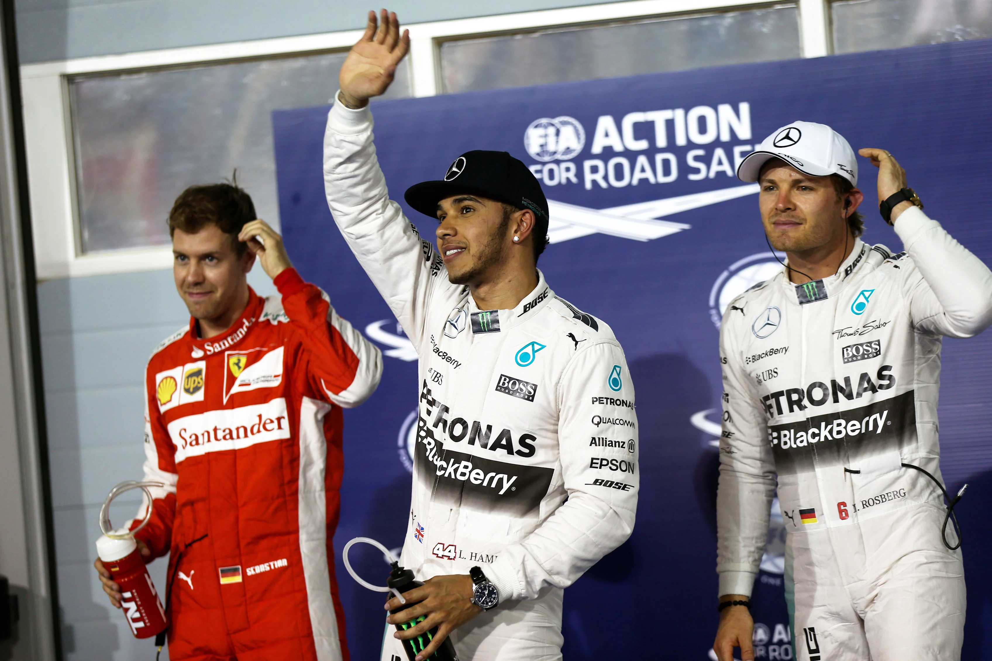 (L to R): Sebastian Vettel (GER) Ferrari, pole sitter Lewis Hamilton (GBR) Mercedes AMG F1 and Nico