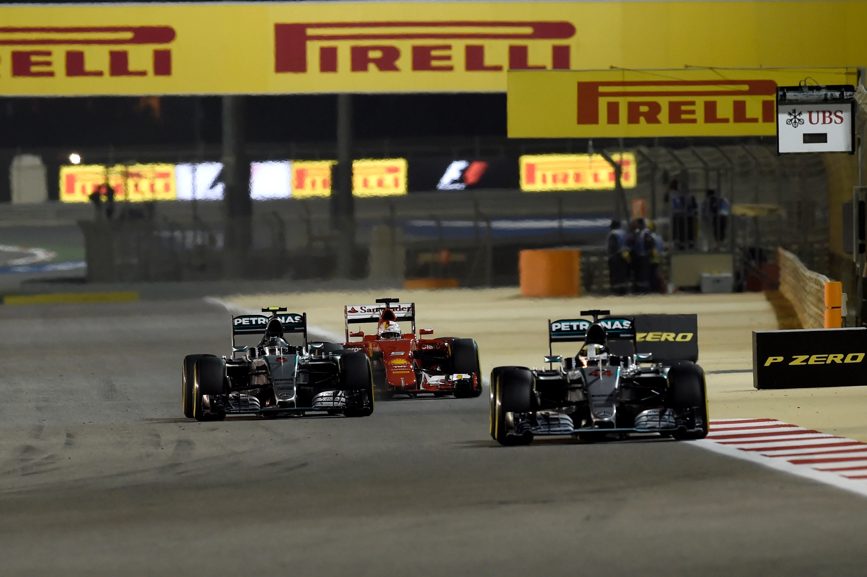 Lewis Hamilton (GBR) Mercedes AMG F1 W06 leads Nico Rosberg (GER) Mercedes AMG F1 W06 and Sebastian