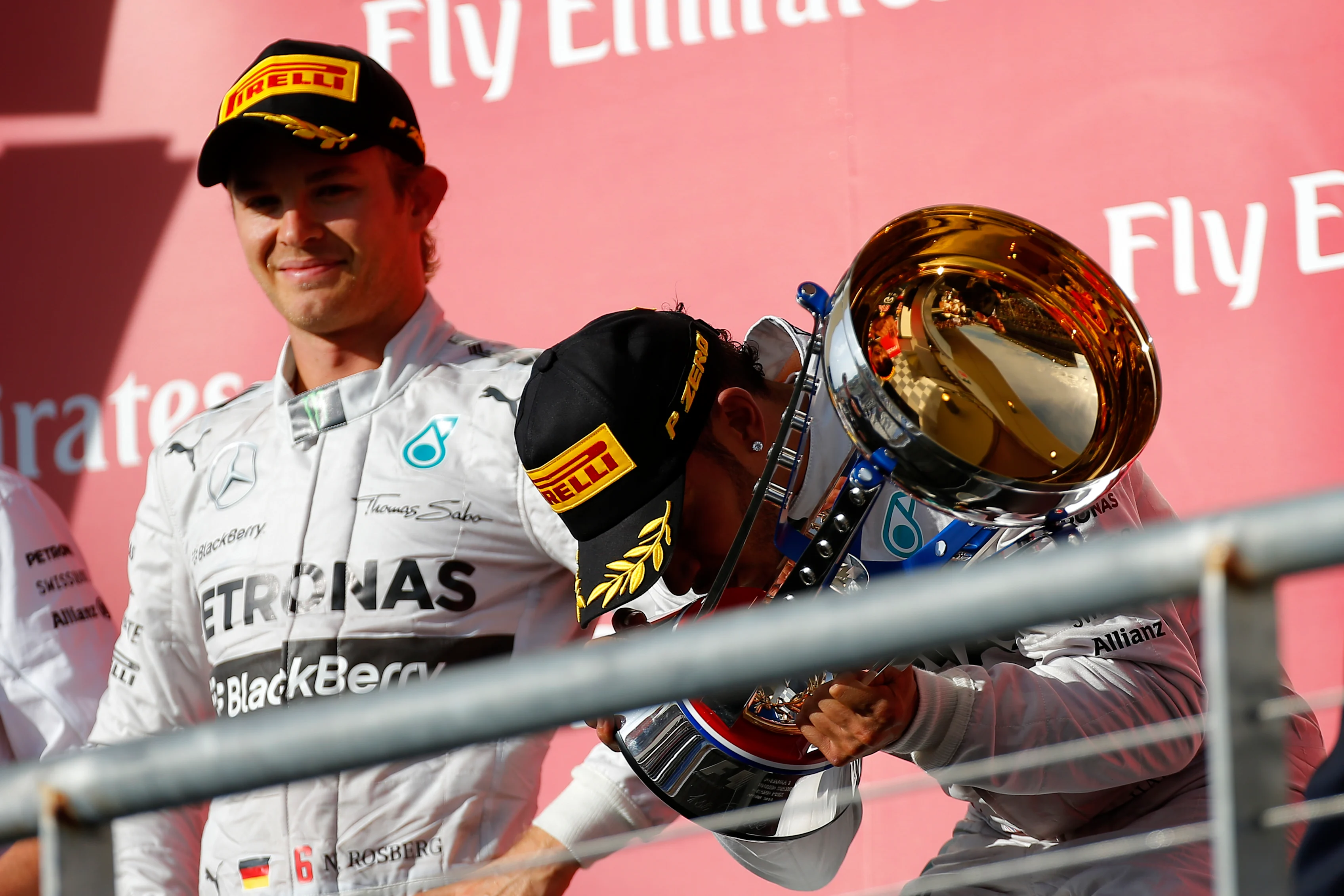 Nico Rosberg (GER) Mercedes AMG F1 and Lewis Hamilton (GBR) Mercedes AMG F1 celebrate on the podium. Formula One World Championship, Rd17, United States Grand Prix, Race, Austin, Texas, USA, Sunday, 2 November 2014